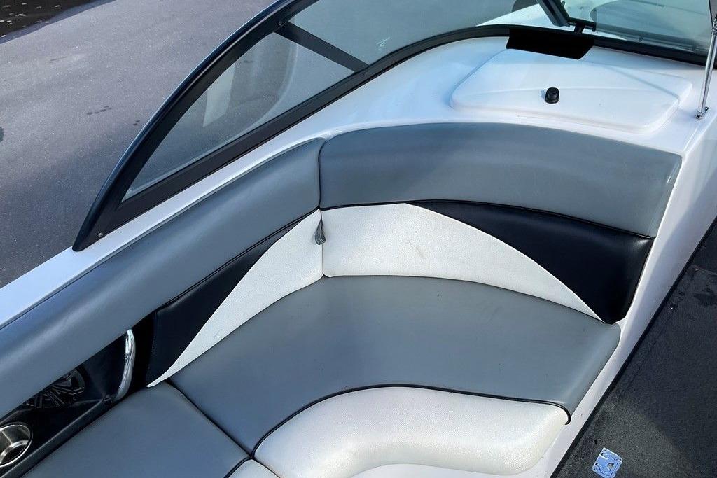 2015 Moomba Outback V boat interior with gray and white seating.