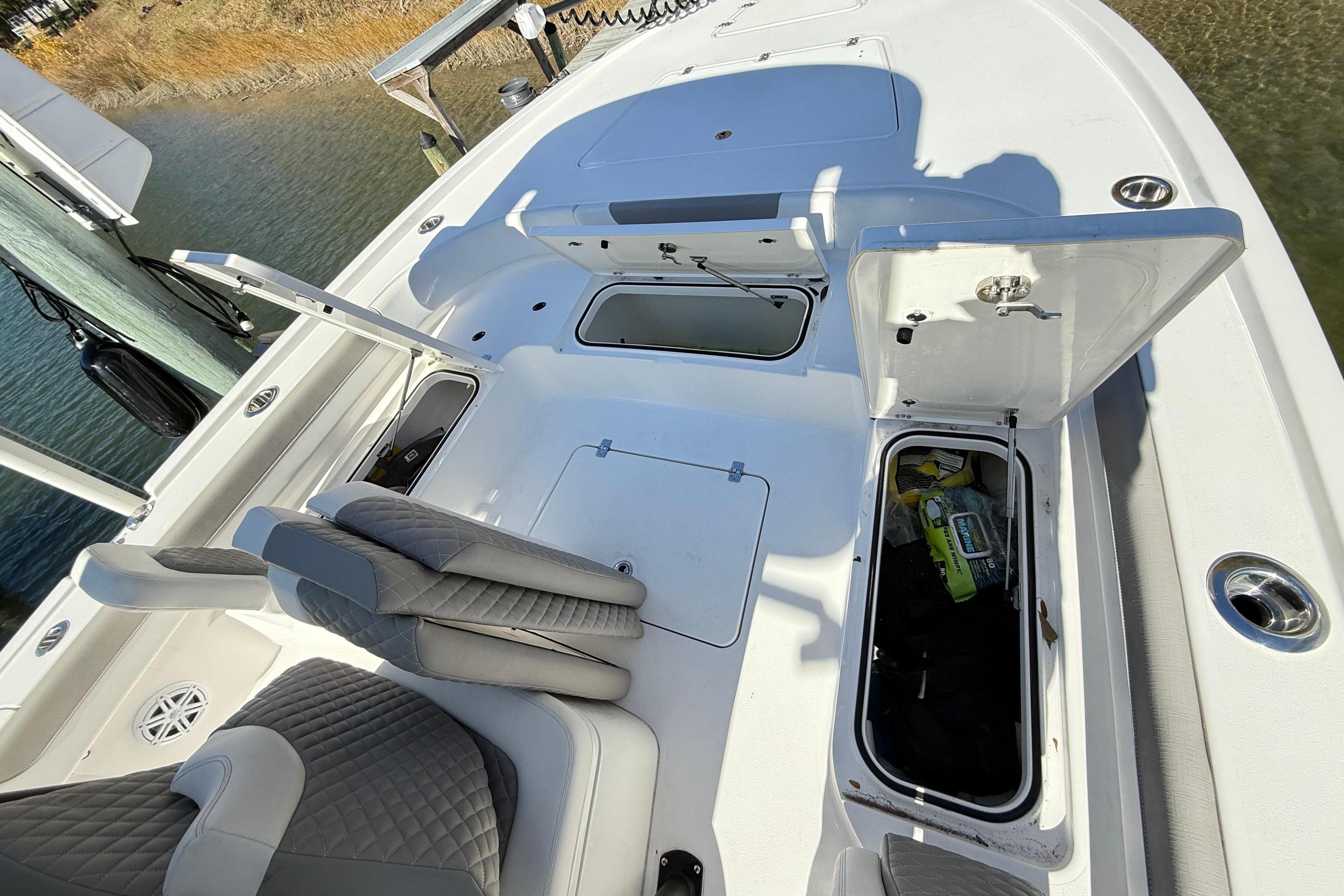 2023 Caymas 281 HB boat interior with open storage compartments.