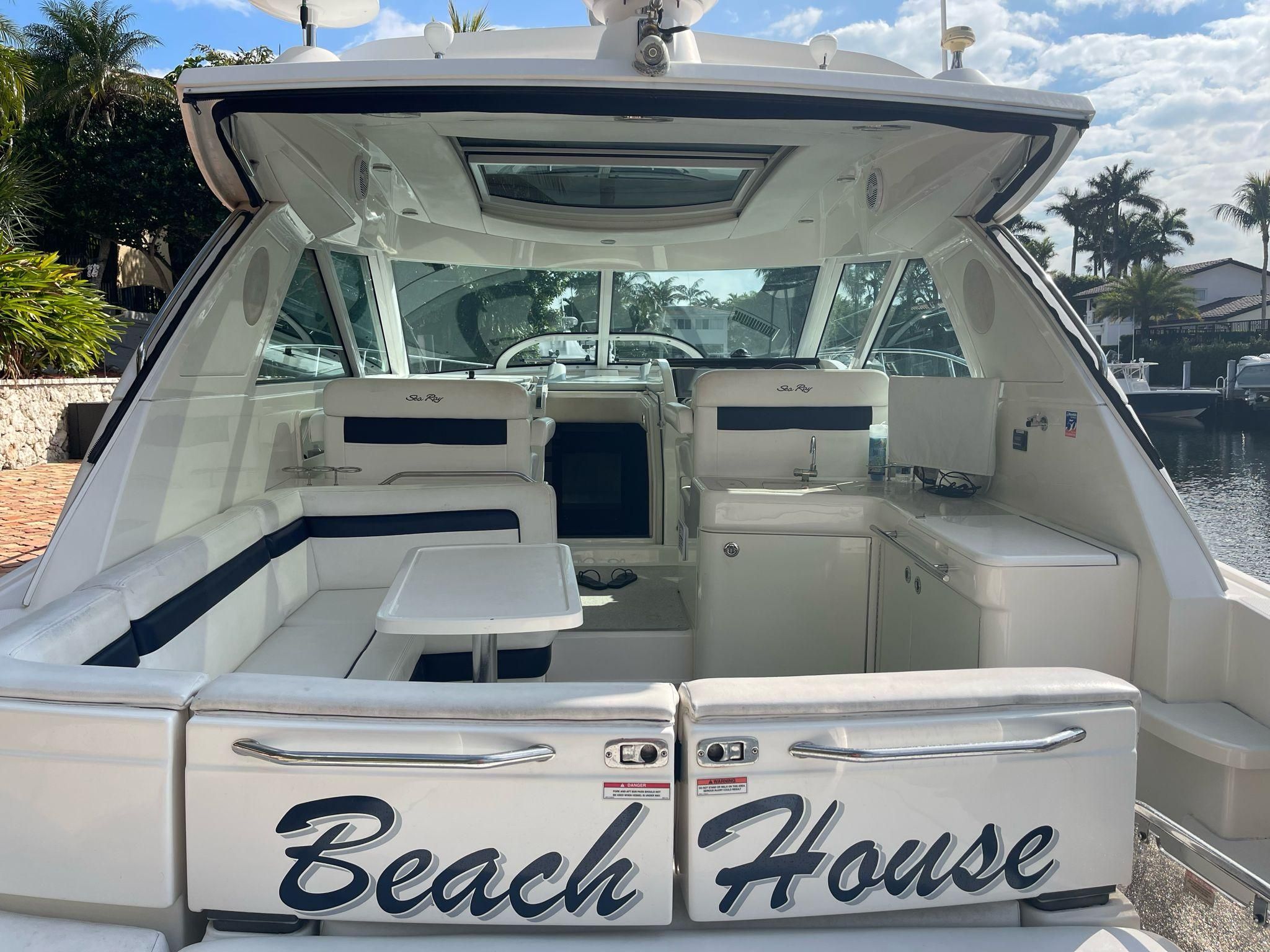 Sea Ray 450 Yacht 2010 with "Beach House" lettering.