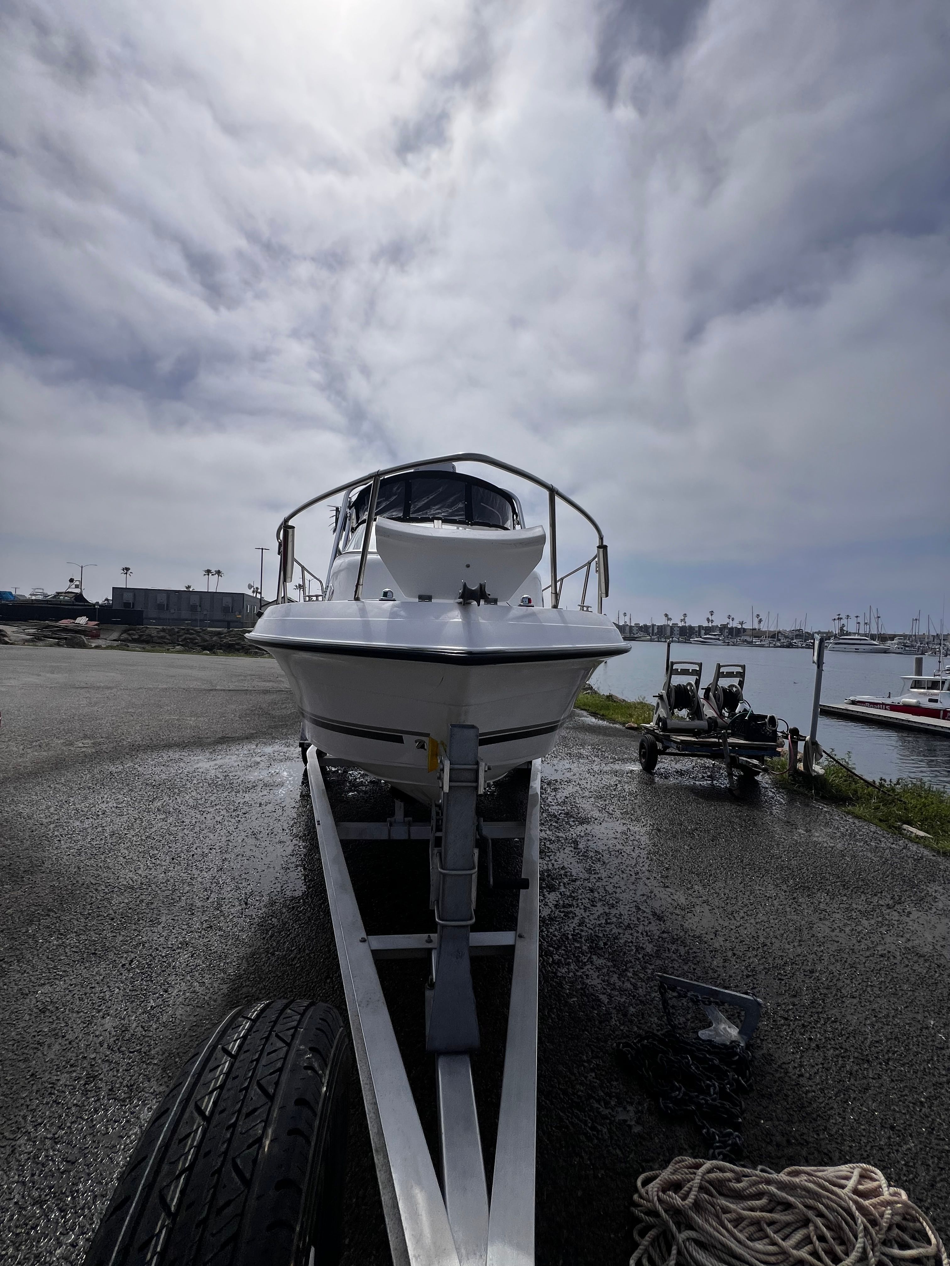 A 2001 Seaswirl Striper 1851 WA on a trailer, ready for launch at the harbor.