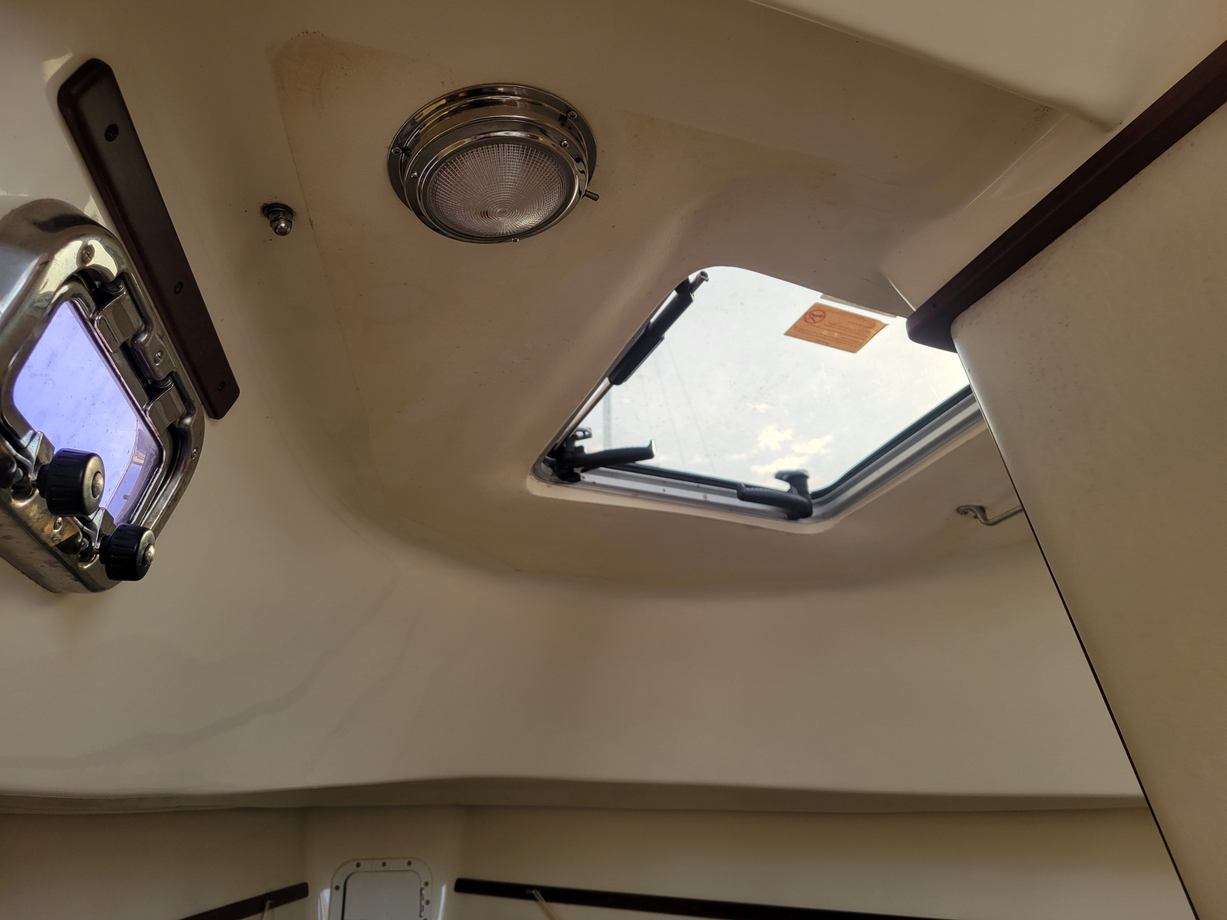 Interior view of a 2018 Hake Seaward 26 RK boat with skylight.