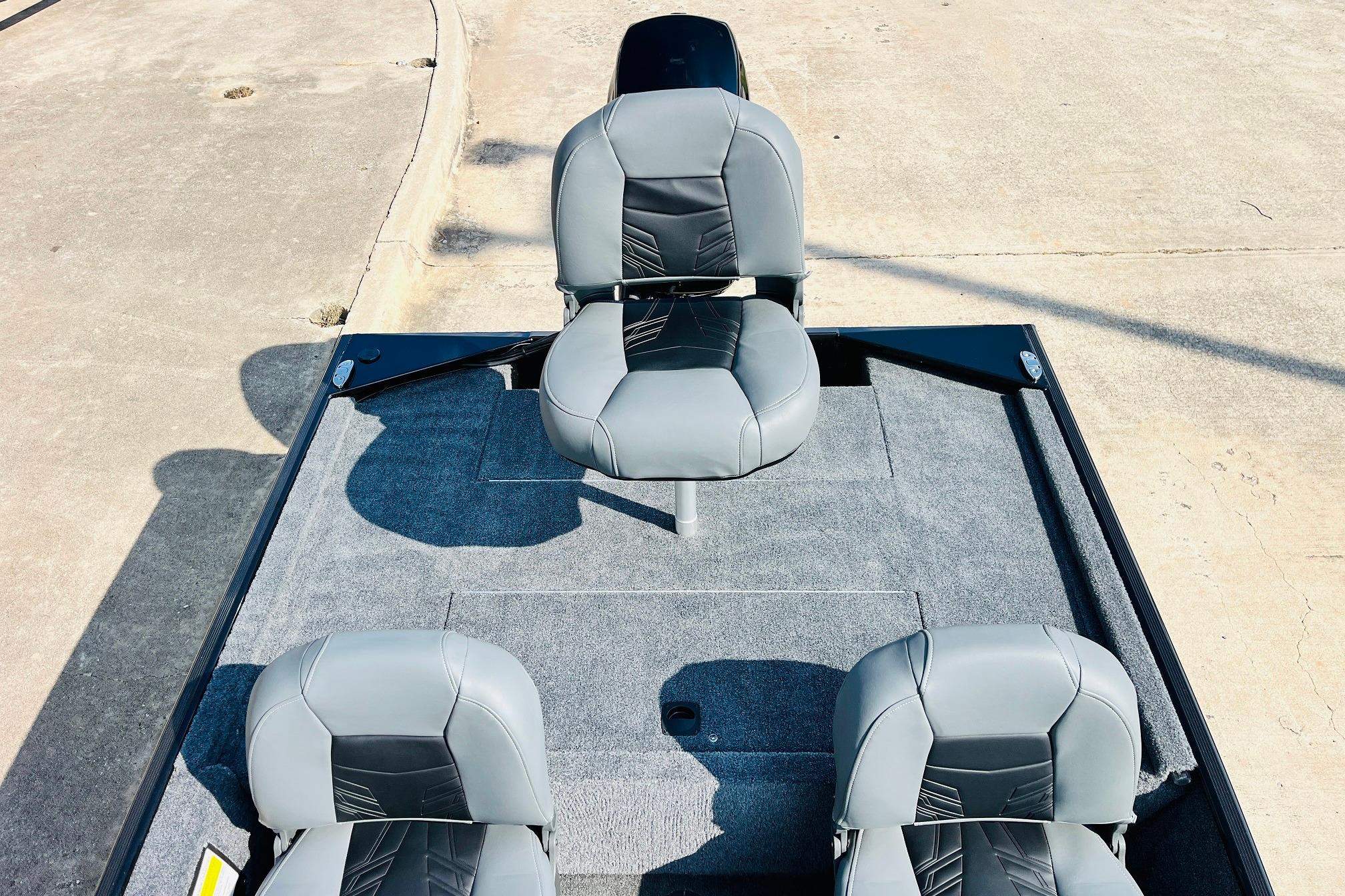 2026 Tracker Bass Tracker Classic XL boat seats on a carpeted deck.