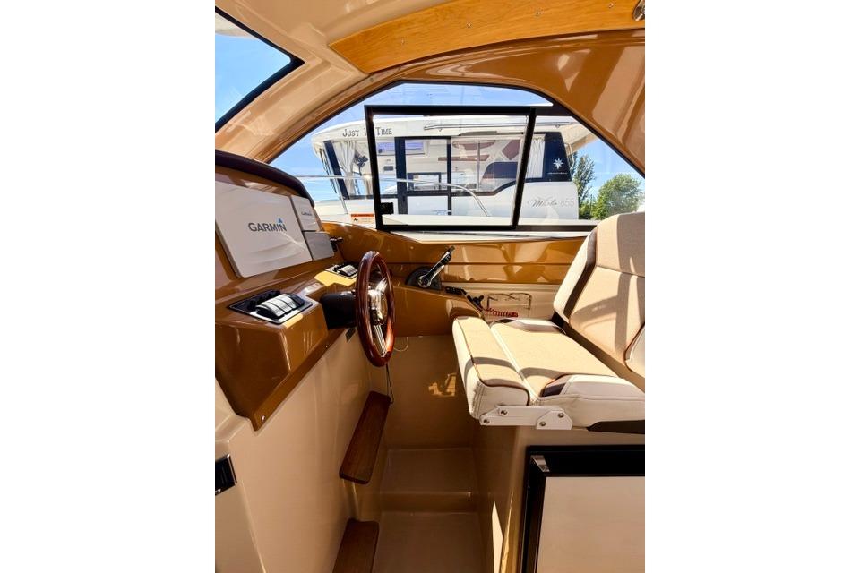 Interior of 2017 Cutwater C-242 Coupe boat with Garmin navigation system.