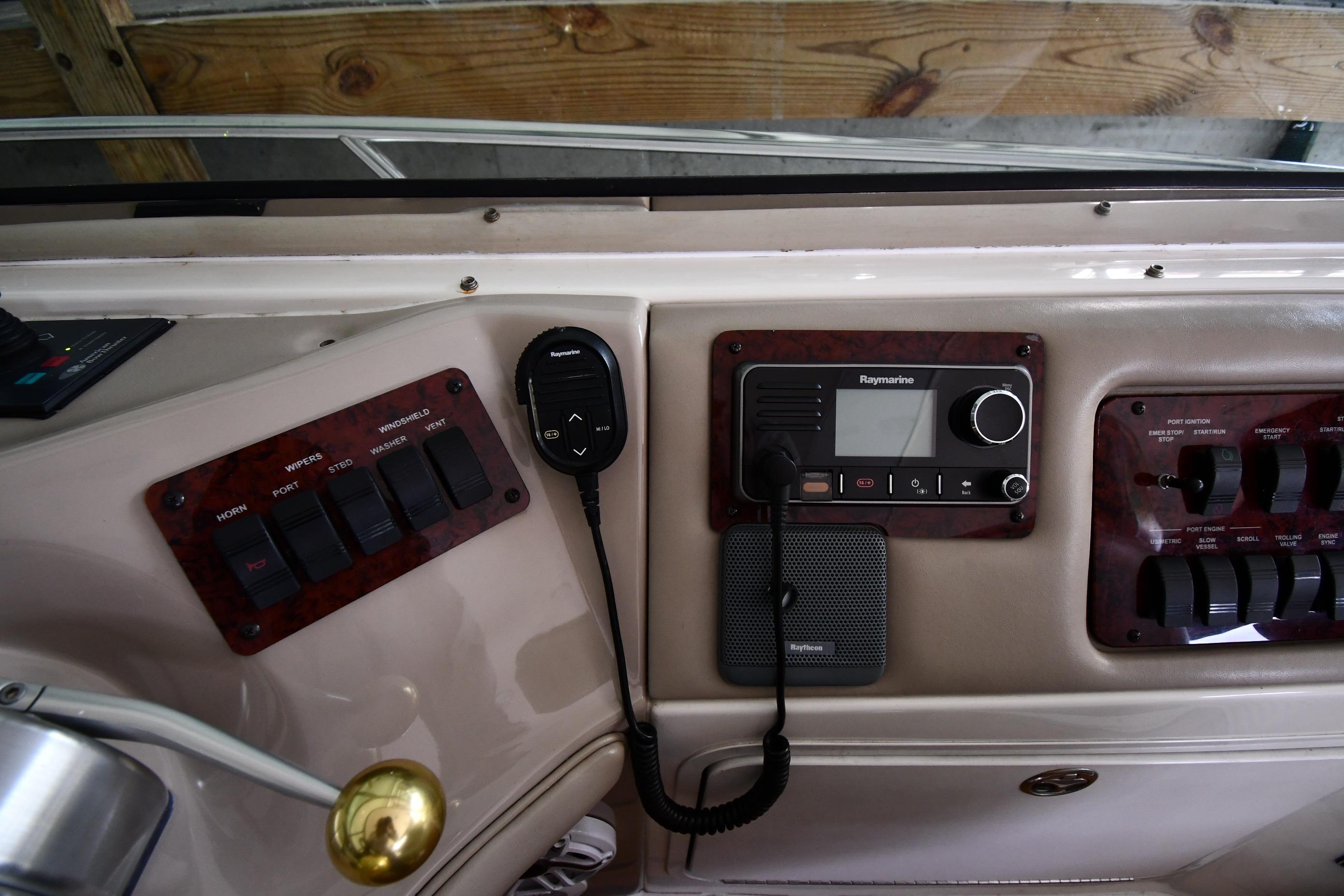 Control panel of a 2001 Sea Ray 540 Sundancer boat with Raymarine equipment.