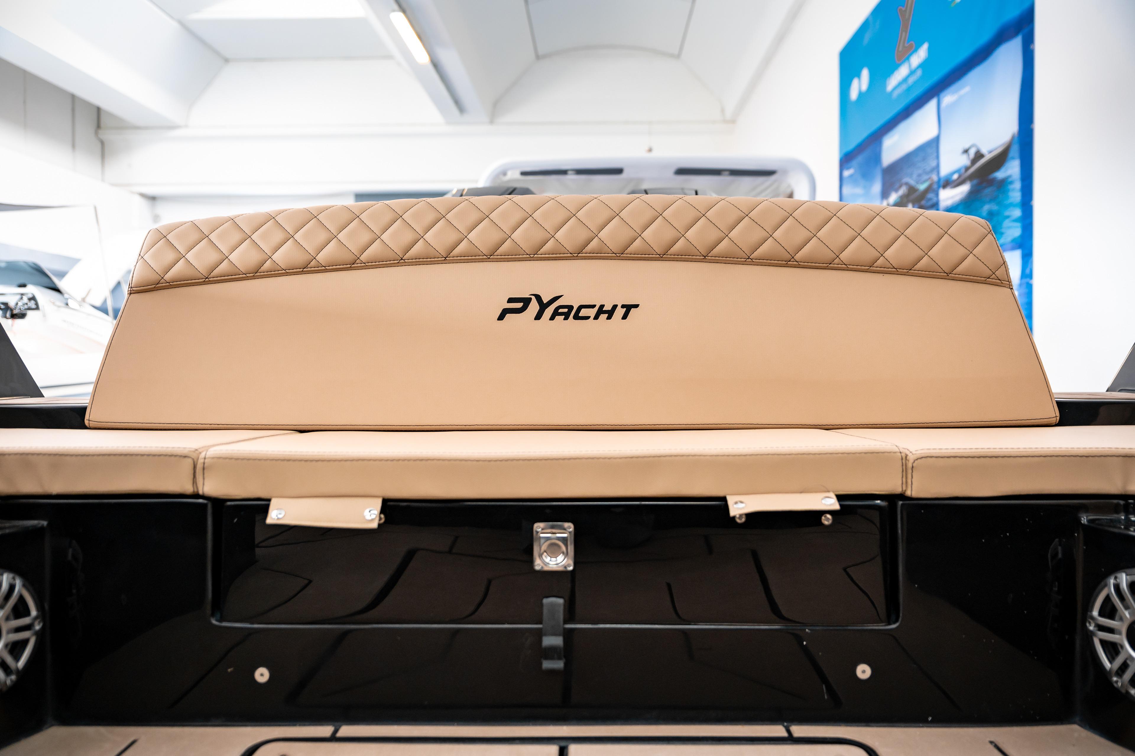 Luxury PYACHT PY 100 XL 2026 model with elegant beige seating in showroom.