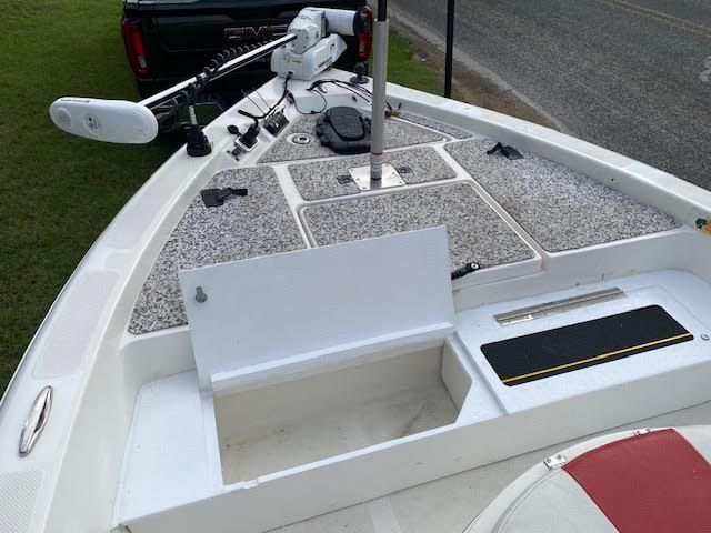 2012 Skeeter ZX200 boat with open storage and trolling motor.