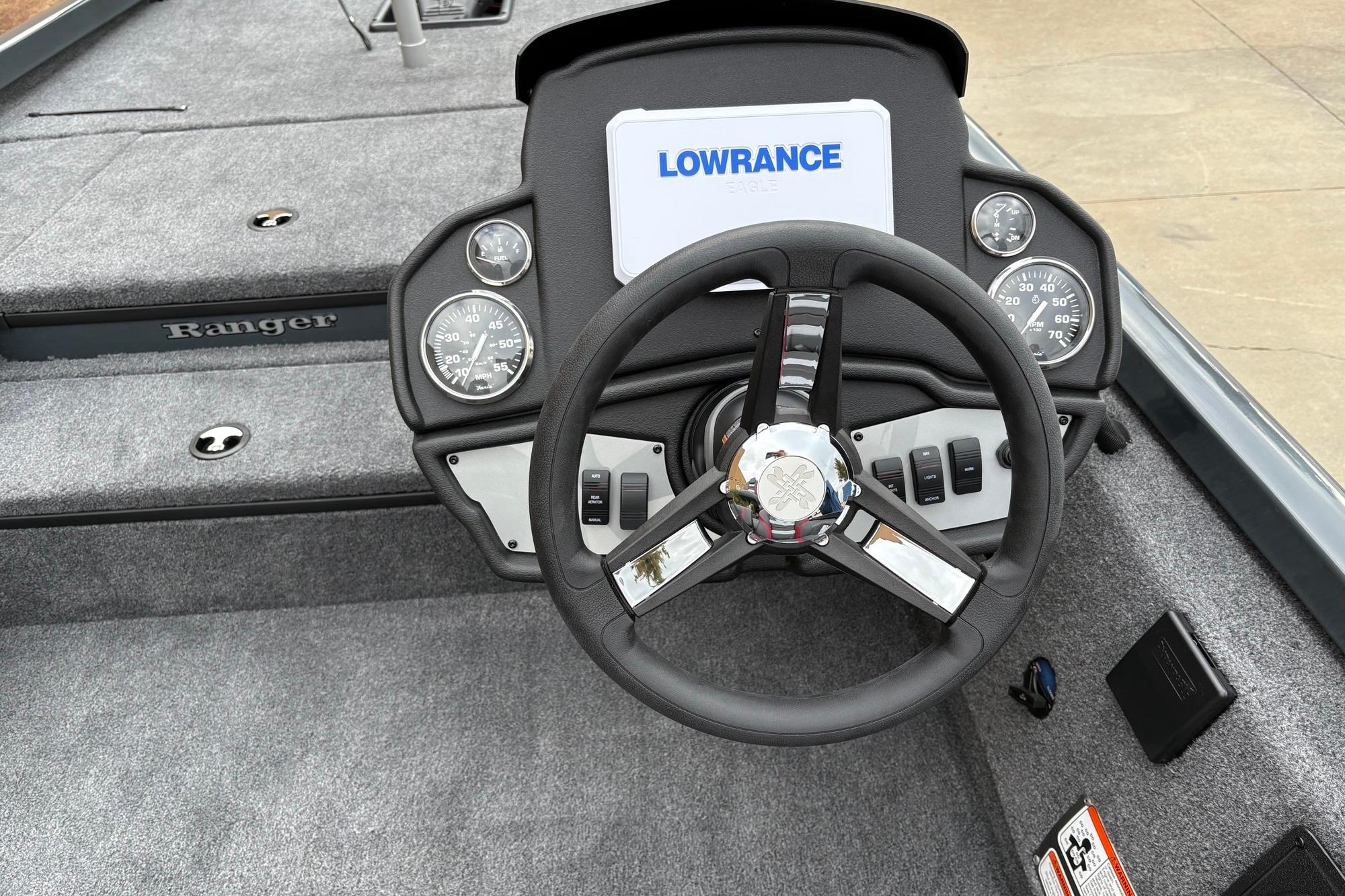 2026 Ranger RT178 boat dashboard with steering wheel and Lowrance display.