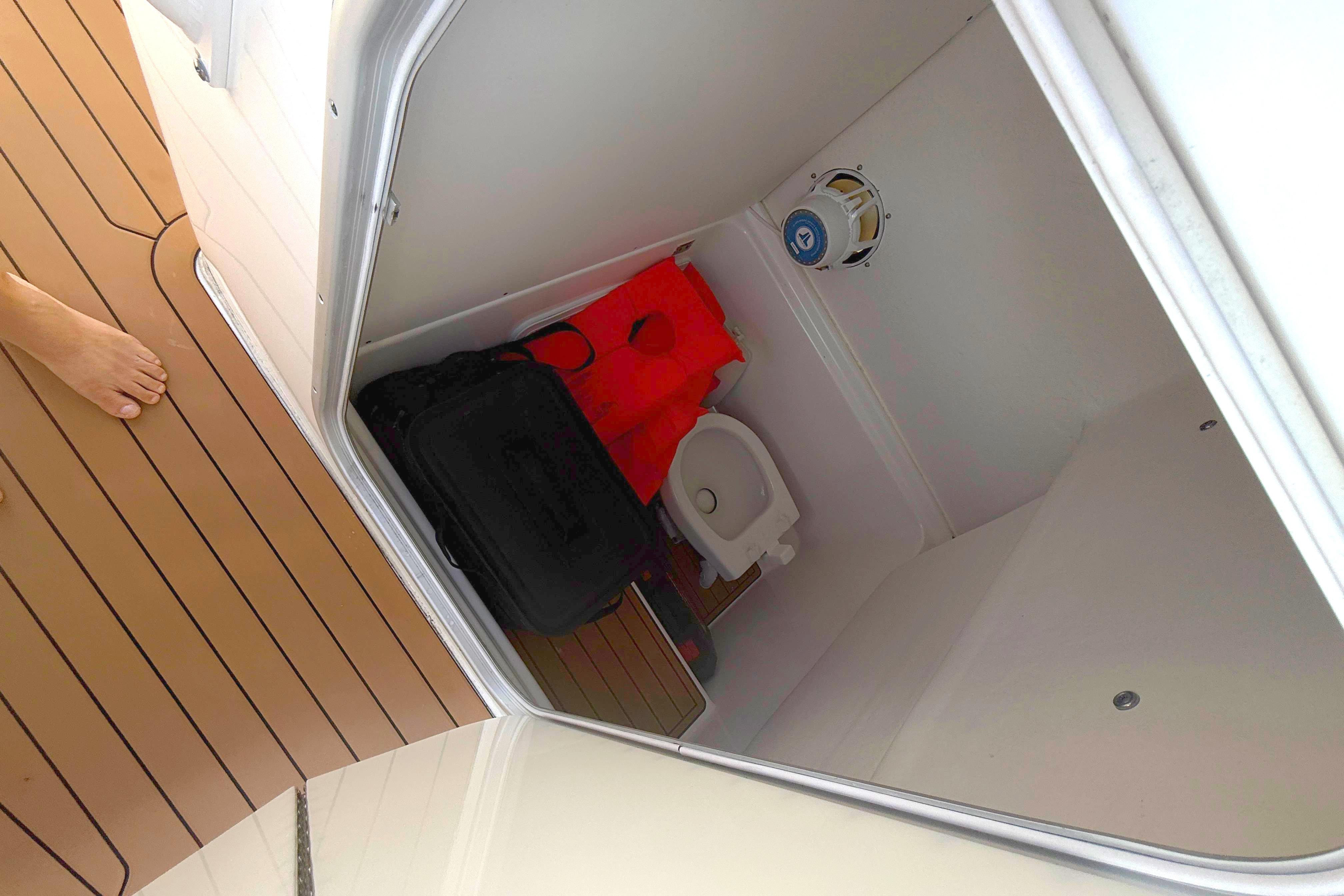 2019 Cape Horn 27XS boat interior with head and life jackets.