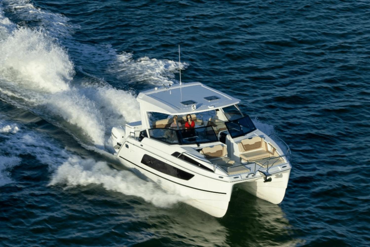 2024 Aquila 36 Sport cruising on open water.