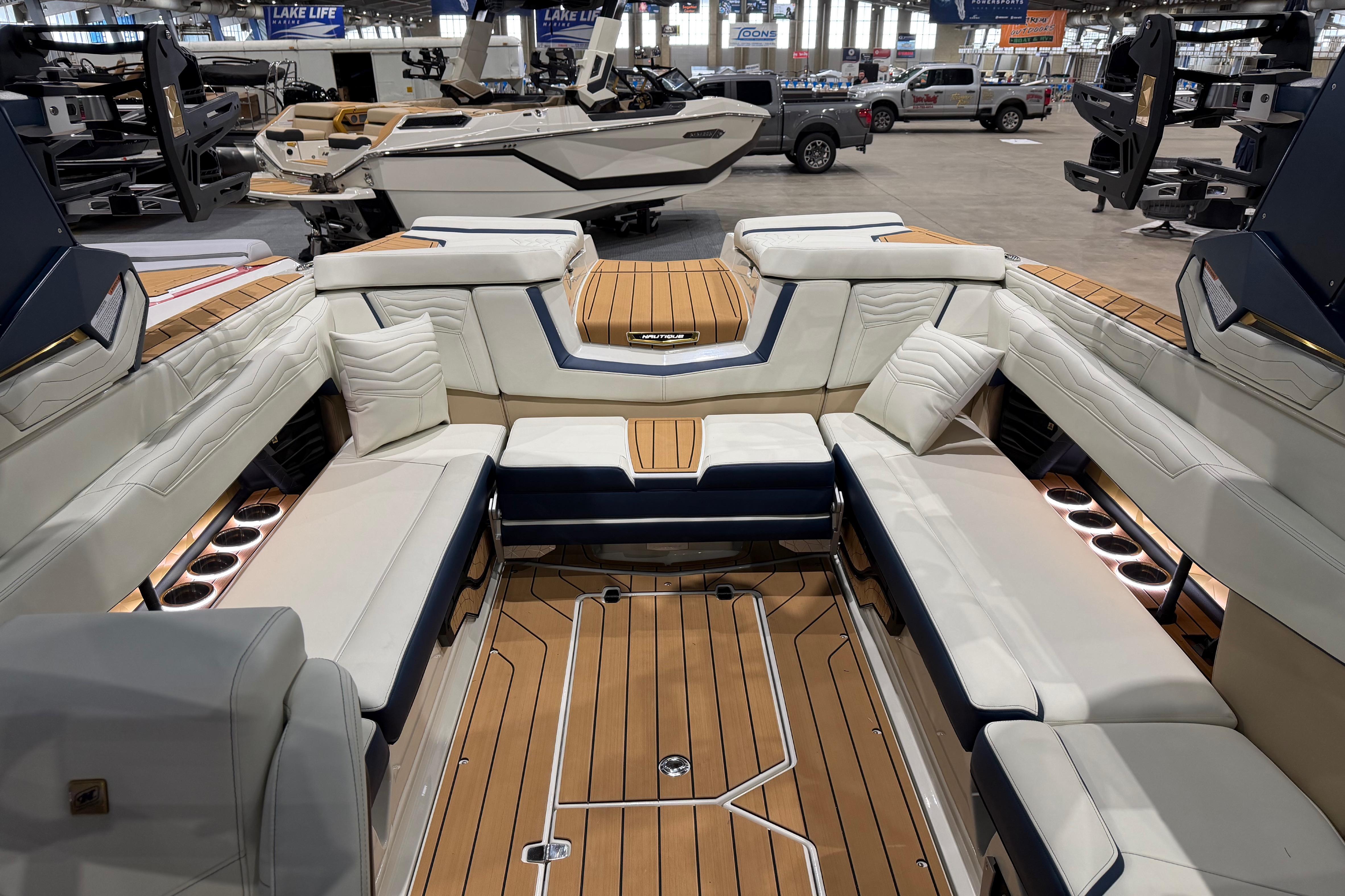 Luxurious interior of 2026 Nautique Super Air Nautique G25 boat with elegant seating and wood accents.