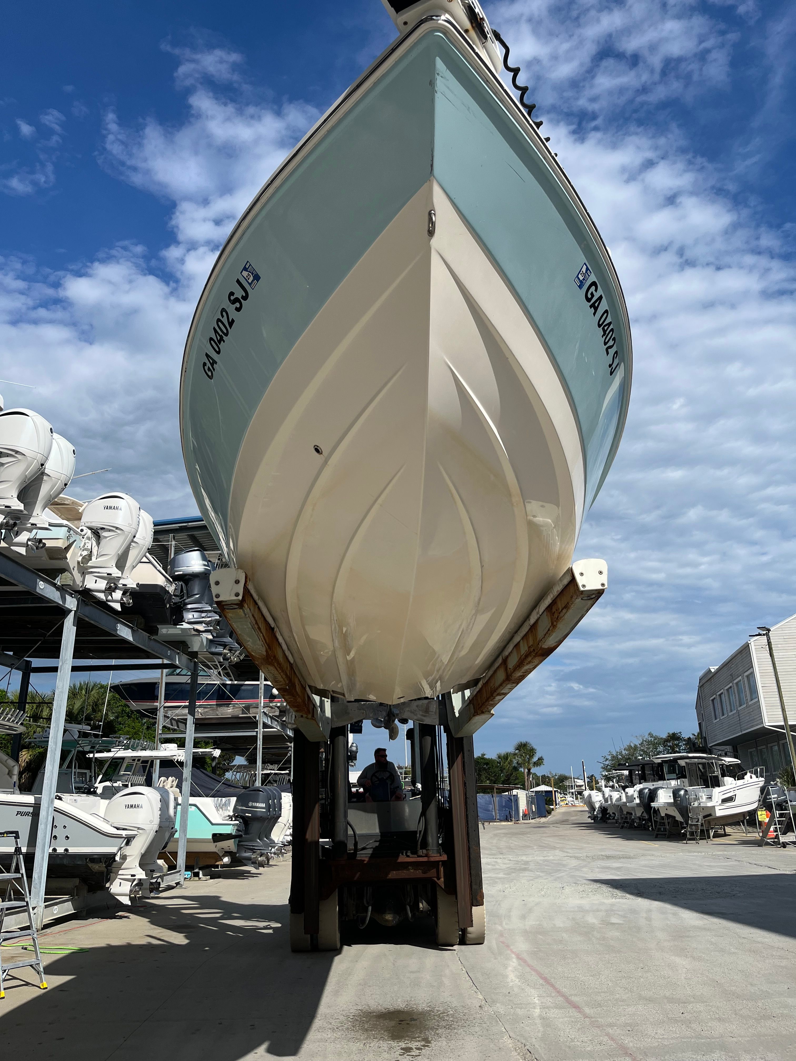 2016 Pathfinder 2400 TRS boat on a boat lift.