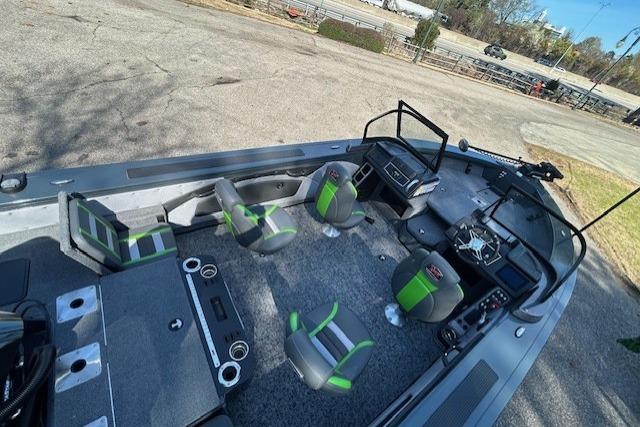2025 Ranger VX1988 WT boat interior with green-accented seats and modern dashboard.