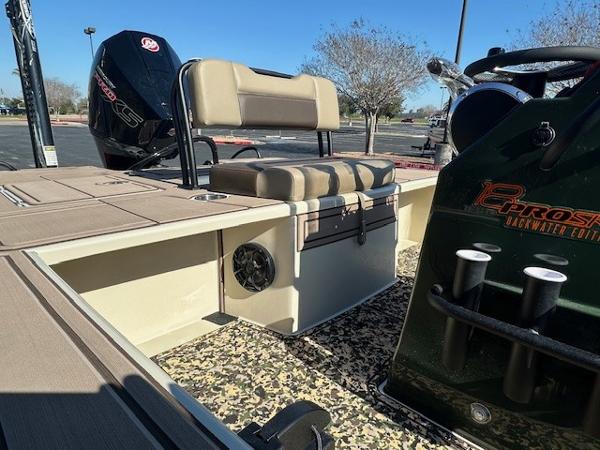 2025 Mako 18 Pro Skiff Backwater Edition boat interior with seating and motor.