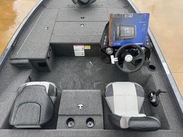 2025 Crestliner XF 179 boat interior with dual seats and navigation system.