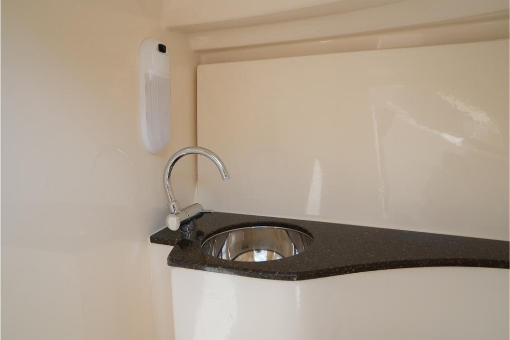 2023 Scout 240 Dorado boat interior sink with modern faucet.