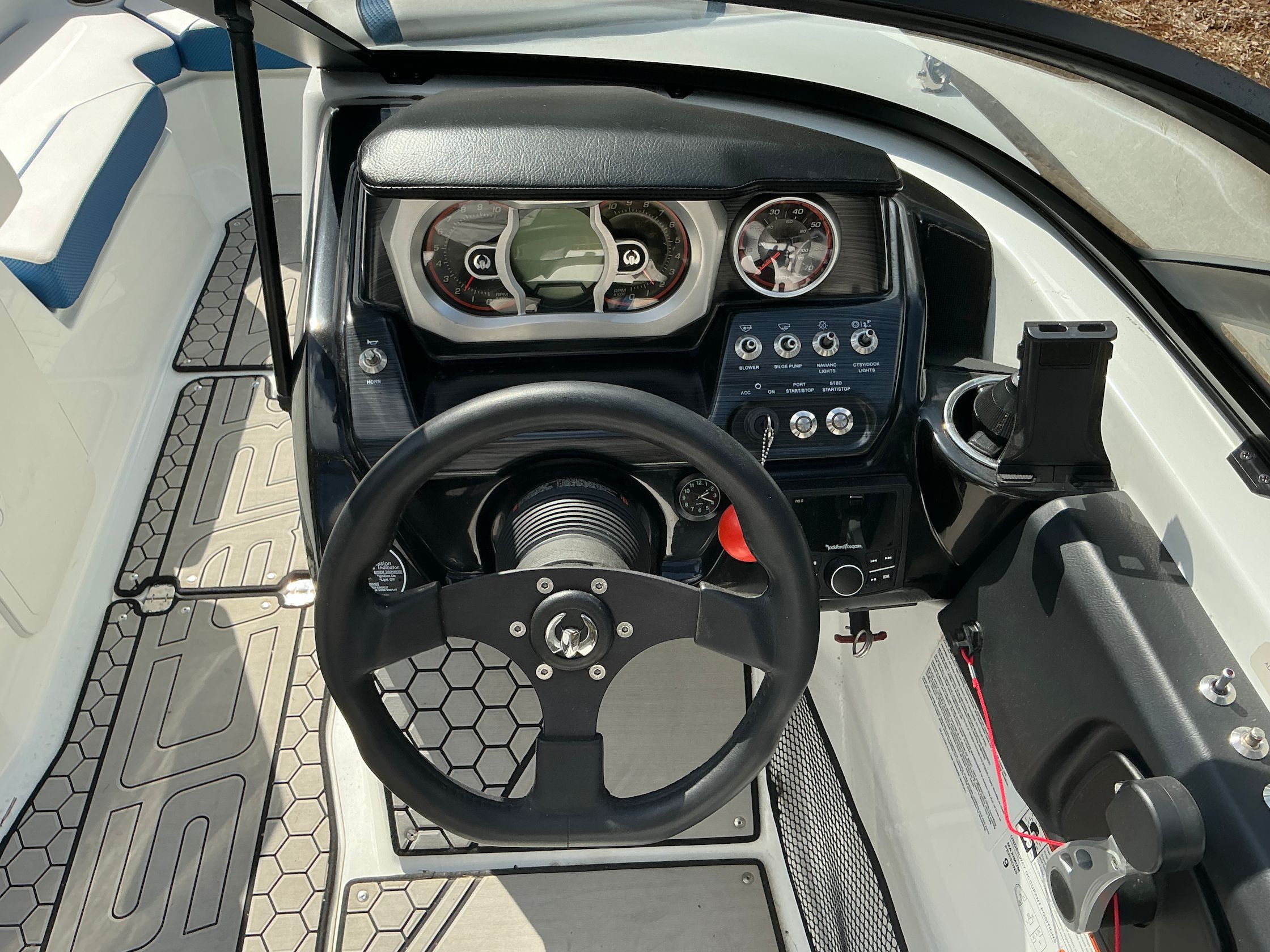 Interior view of 2021 Scarab 215 ID boat cockpit.
