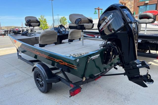 2026 Tracker Bass Tracker Classic Limited boat with Mercury engine, parked on a trailer.