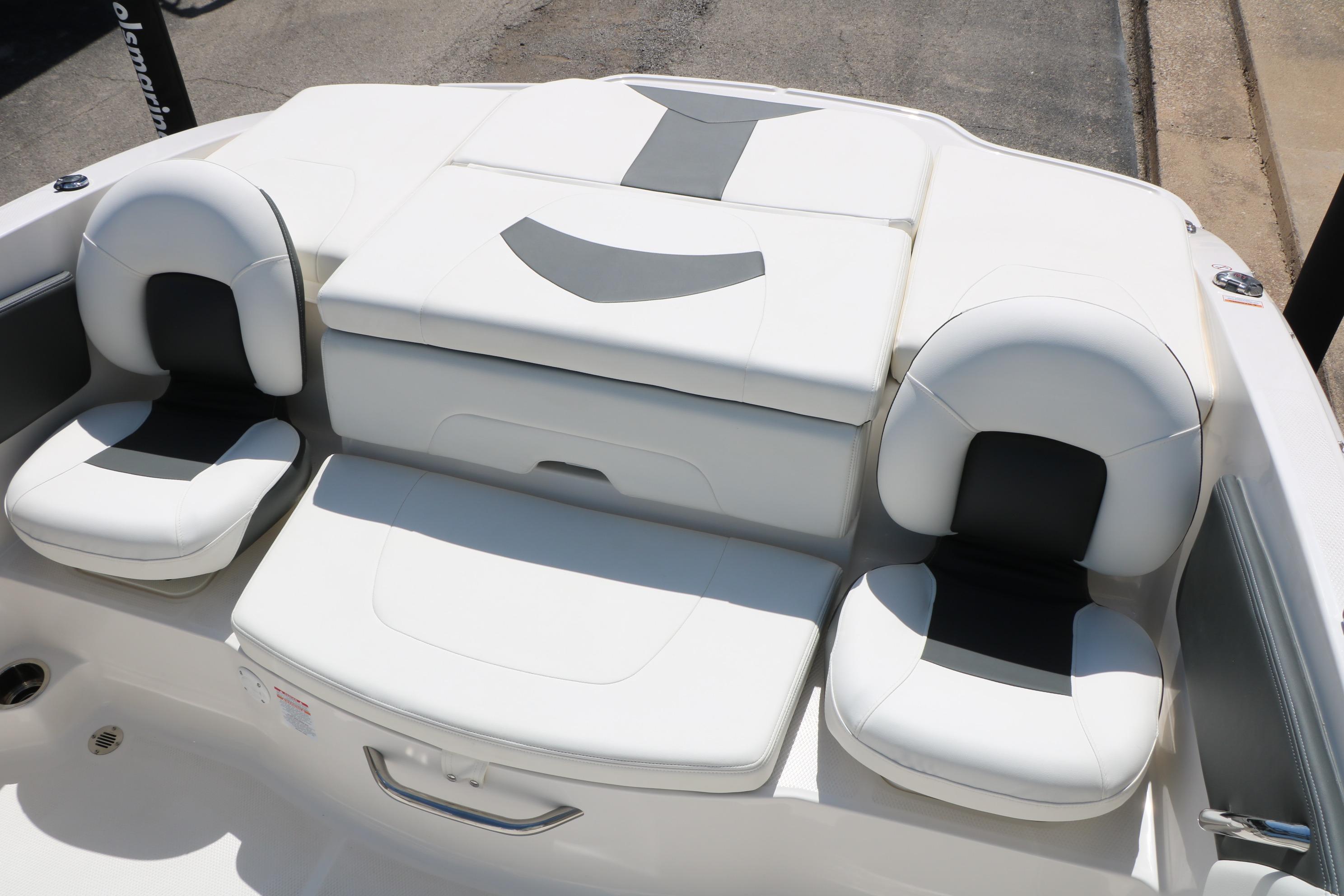 2025 Chaparral 21 SSi Ski & Fish boat interior with white cushioned seating.