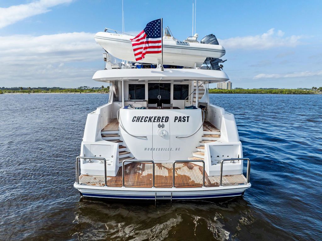 Rear view of 1999 Westport 112 yacht on the water.