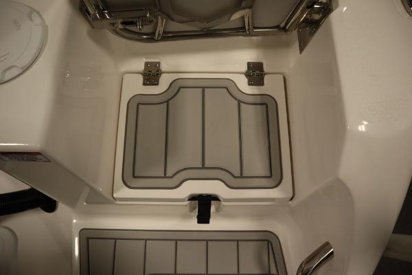 2025 Sea Fox 228 Commander boat storage compartment with secure latch and durable hinges.