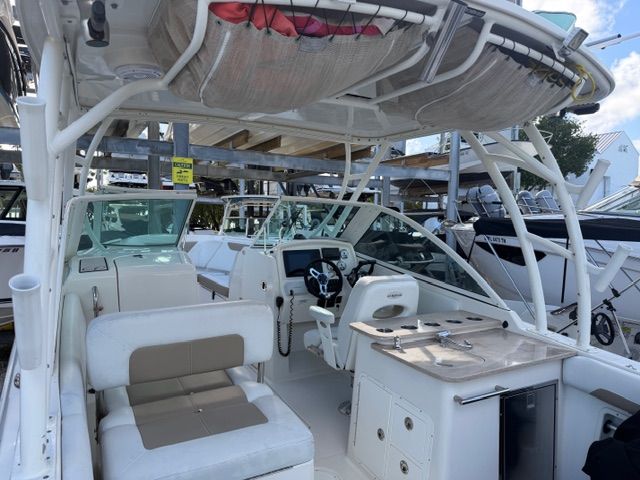 Interior view of a 2016 Sailfish 275 DC boat in the marina.