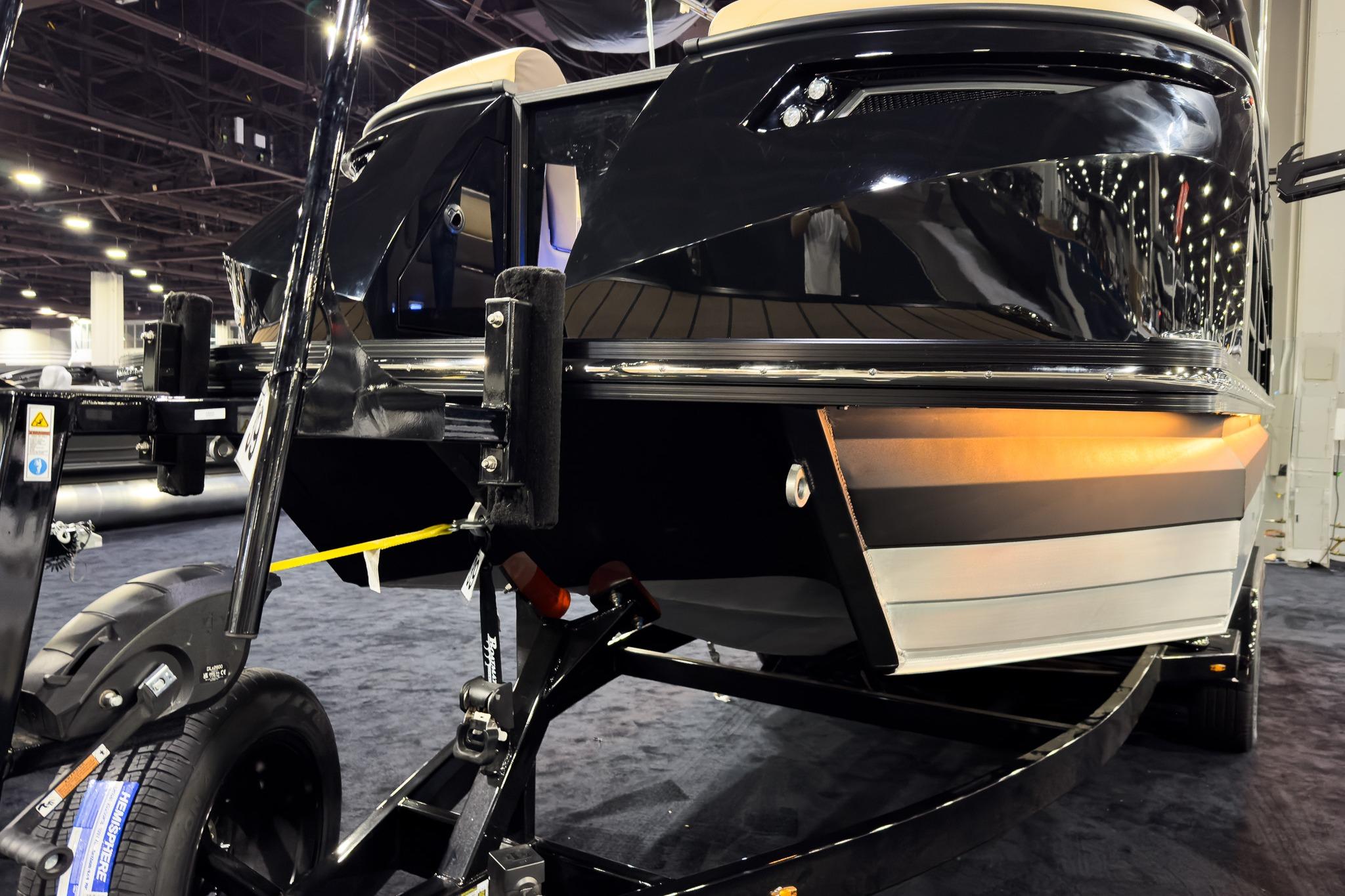 2026 Montara Surf Boss EVO - SLDH 25' boat on display at an indoor exhibition.