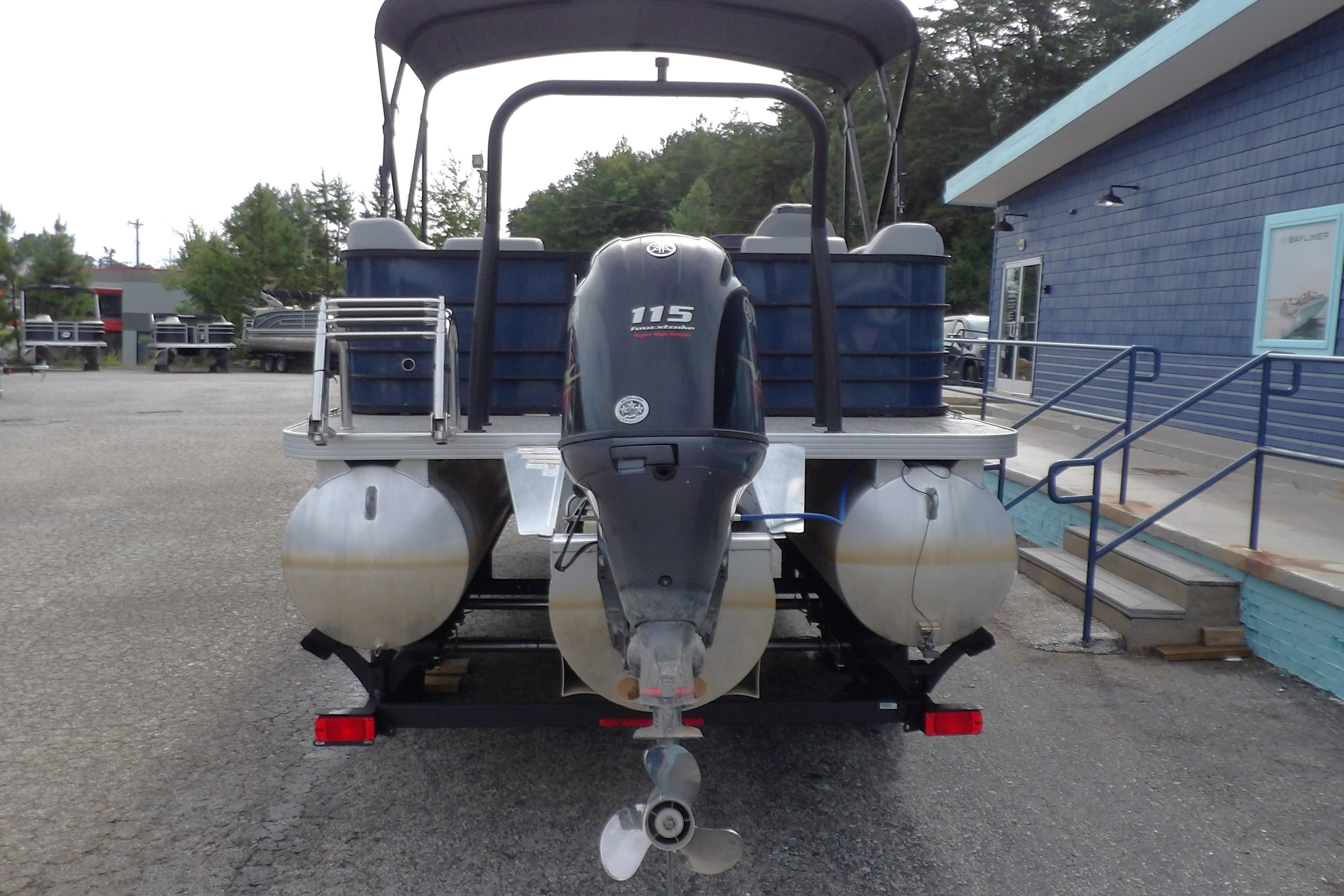 2022 Veranda Vista View 22RC pontoon boat with 115 horsepower outboard motor, rear view.