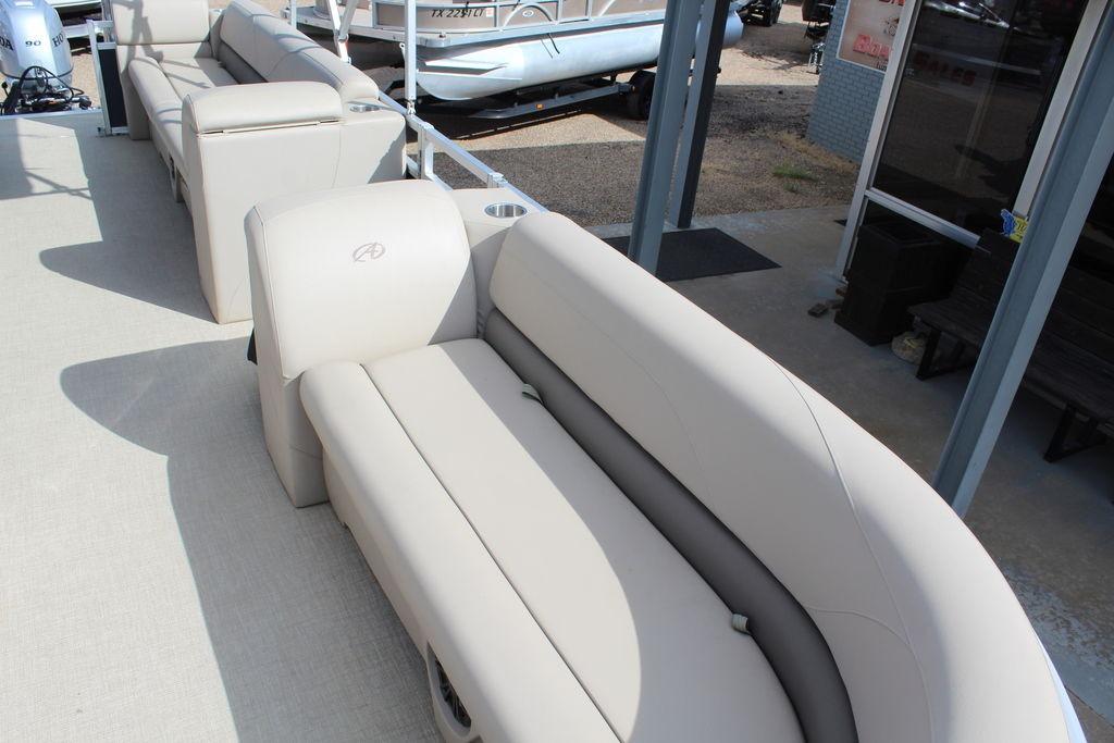 2021 Avalon VLS Quad Lounge 22 FT with beige seating, showcasing luxurious boat interior.