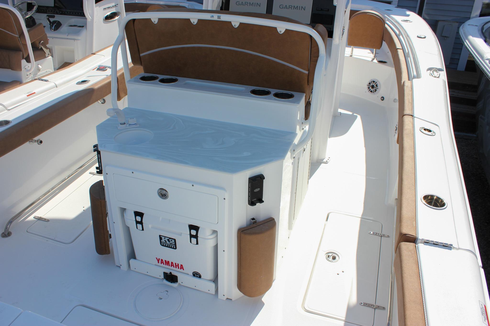 2027 Sea Hunt Ultra 275 SE boat interior with seating and storage features.