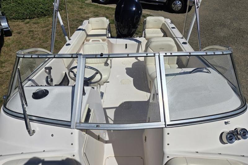 2007 Grady-White Tournament 205 boat interior with seating and steering wheel.
