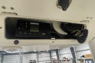 2022 Robalo R247 Dual Console boat electronics compartment with Simrad system.