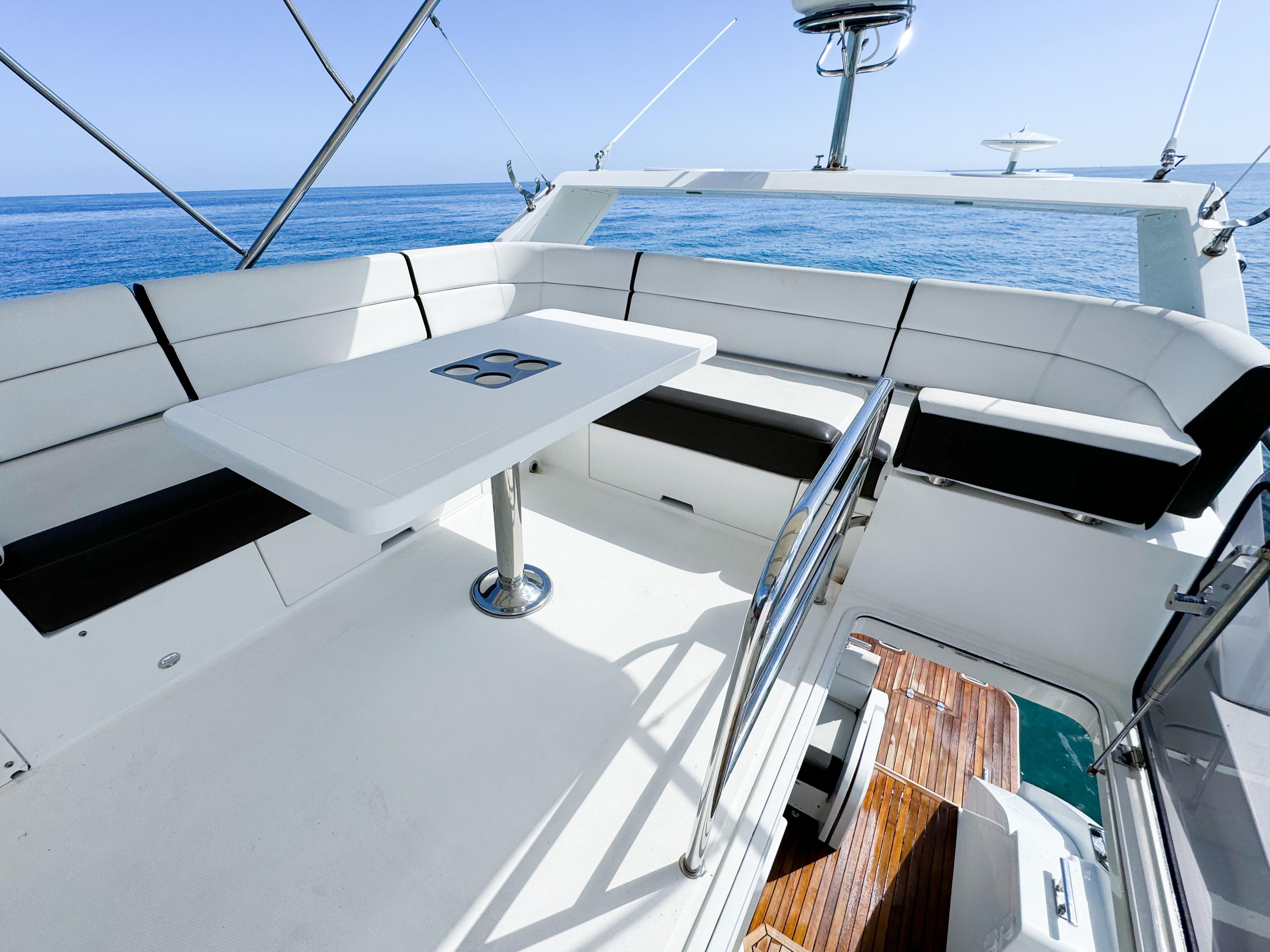 Luxurious 2016 Galeon 420 Fly yacht with spacious seating and ocean view.