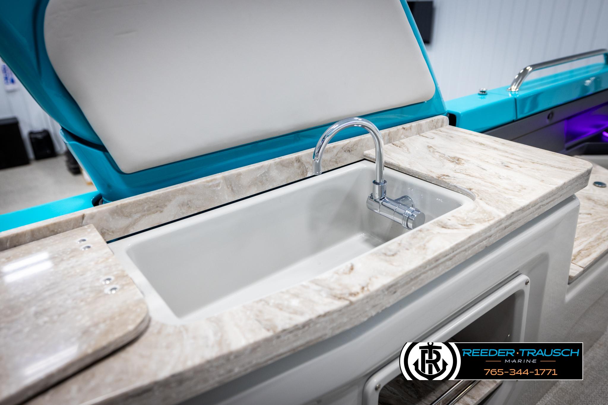 Luxury sink on Avalon 2585 Excal VRBW 2025 boat, featuring marble countertop and modern faucet.
