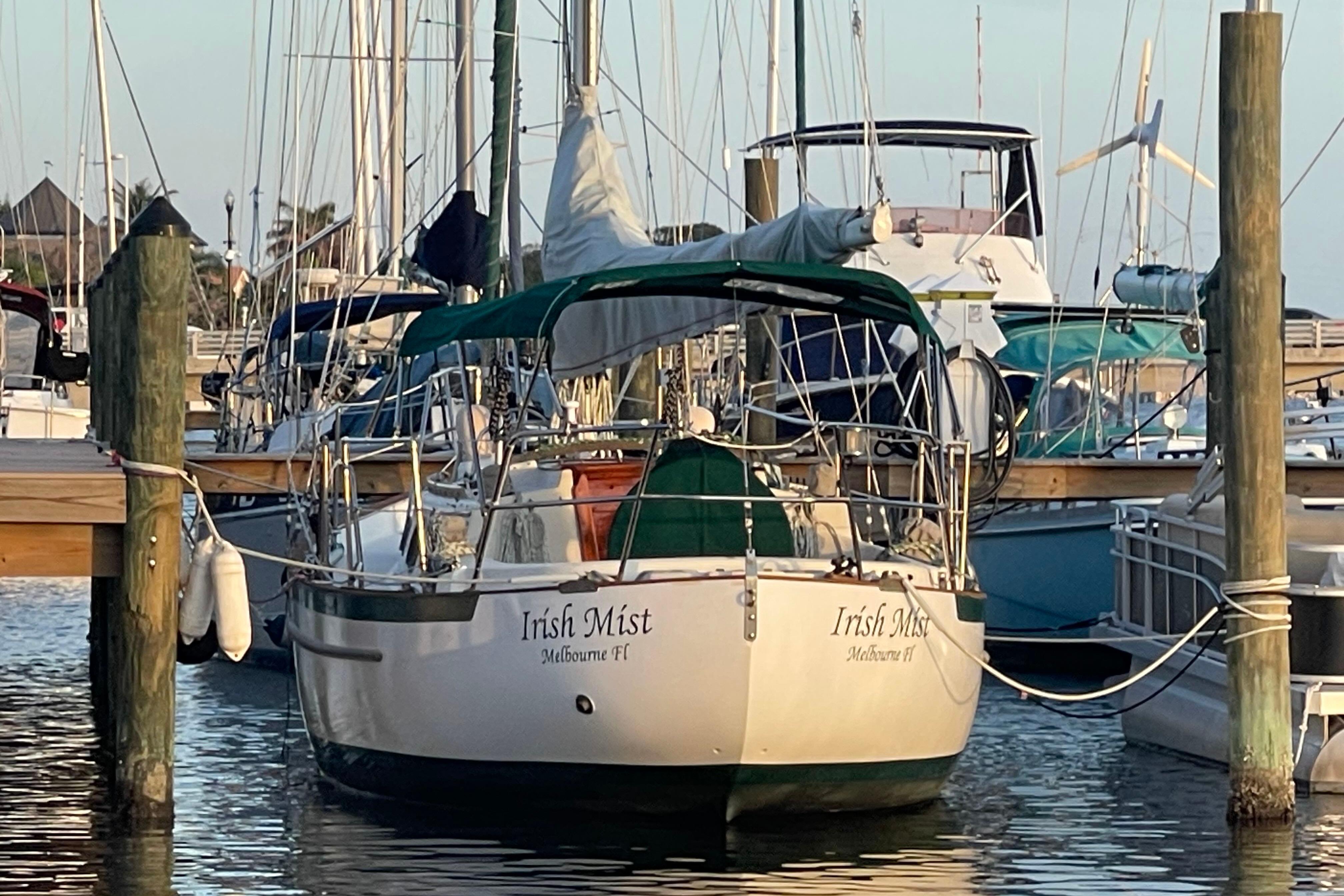 1987 Pacific Seacraft 34 sailboat "Irish Mist" docked in a marina, Melbourne, FL.