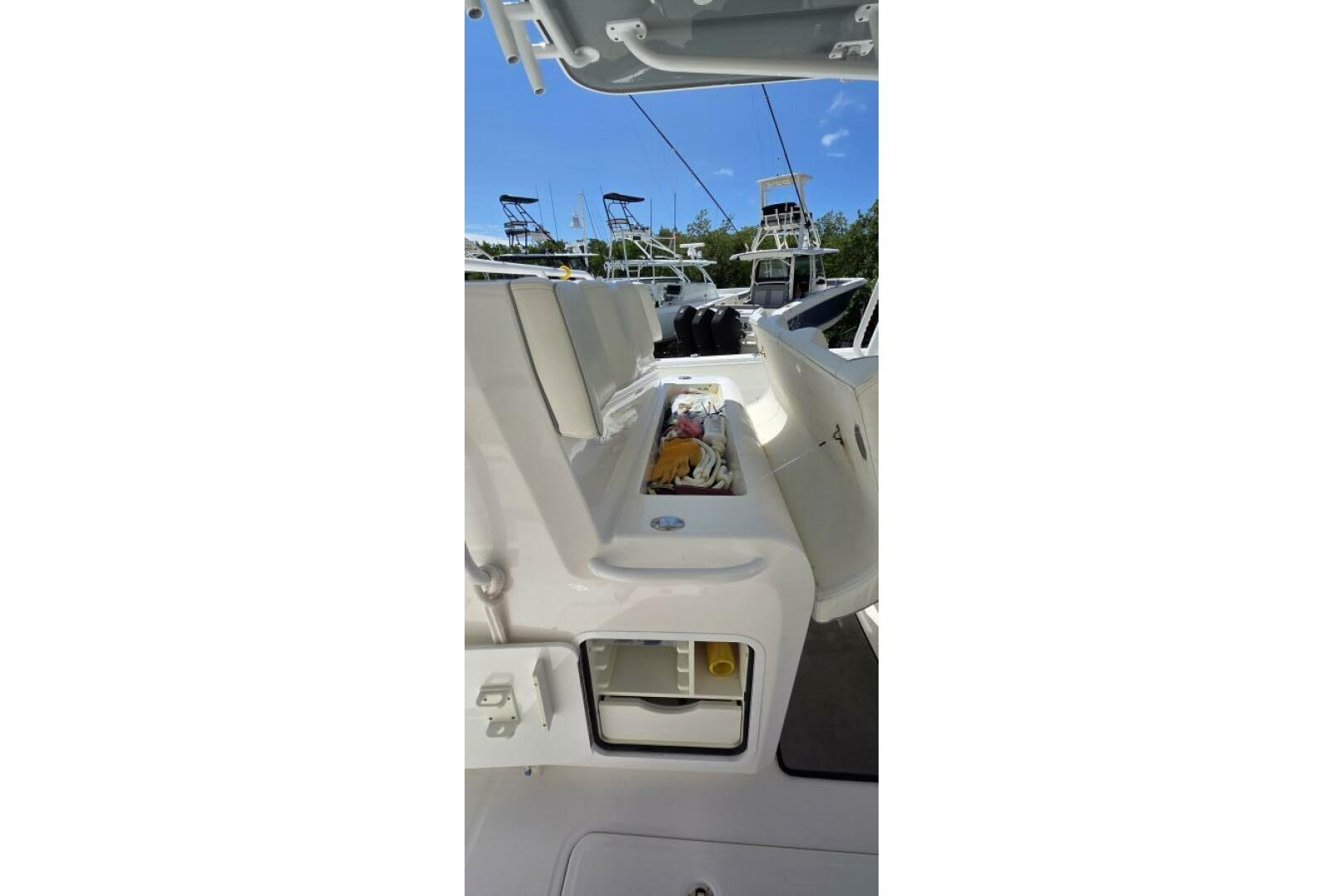 2020 Invincible 35 Catamaran interior view with open storage compartments.