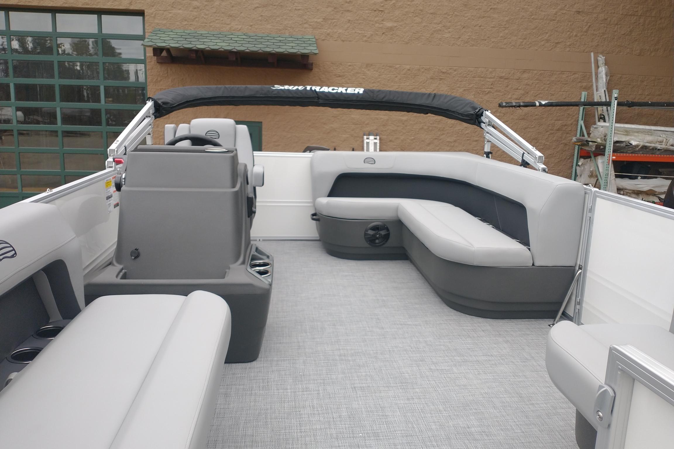 2026 Sun Tracker Party Barge 16 DLX interior with spacious seating and modern design.