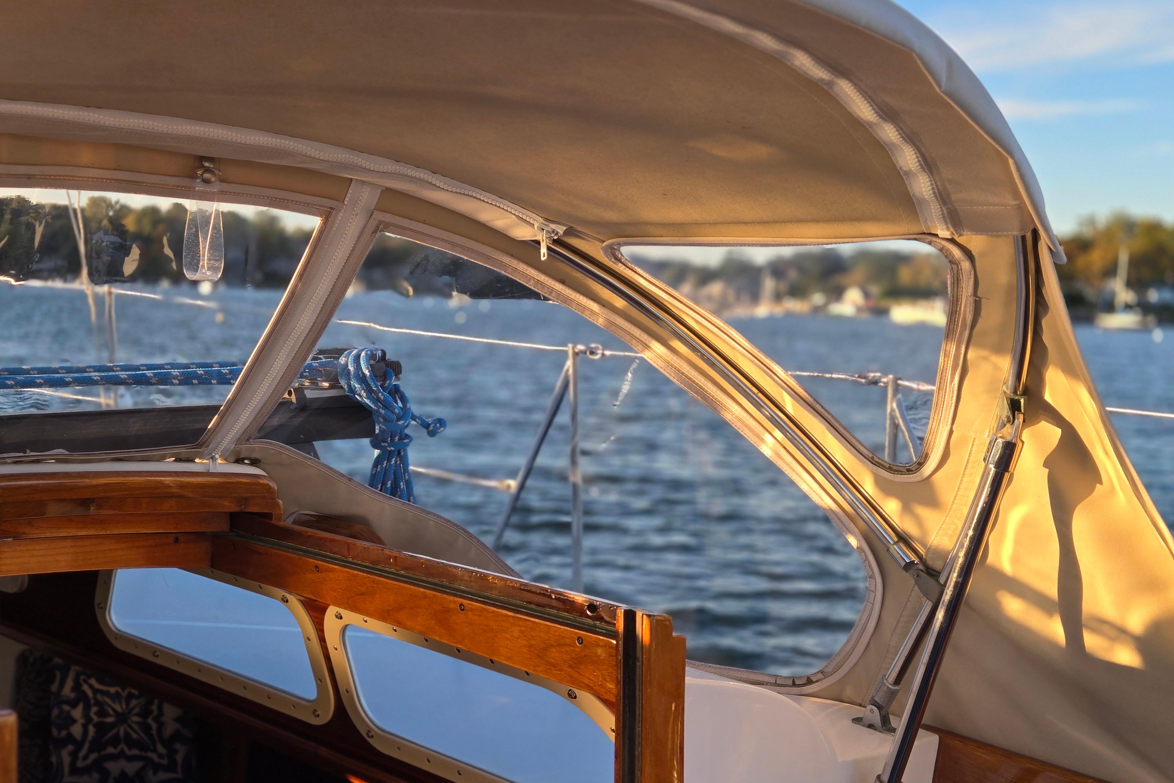 1970 Hinckley Bermuda 40 sailboat cockpit with scenic water view.
