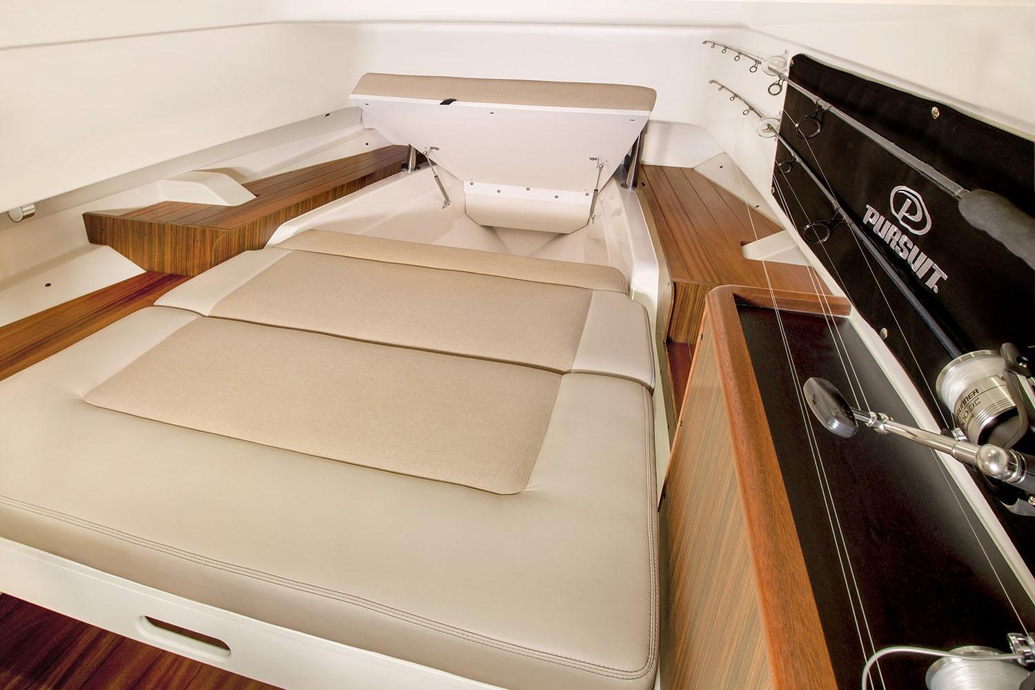 Manufacturer Provided Image: Interior cabin of a 2021 Pursuit S 328 Sport boat with cushioned seating.