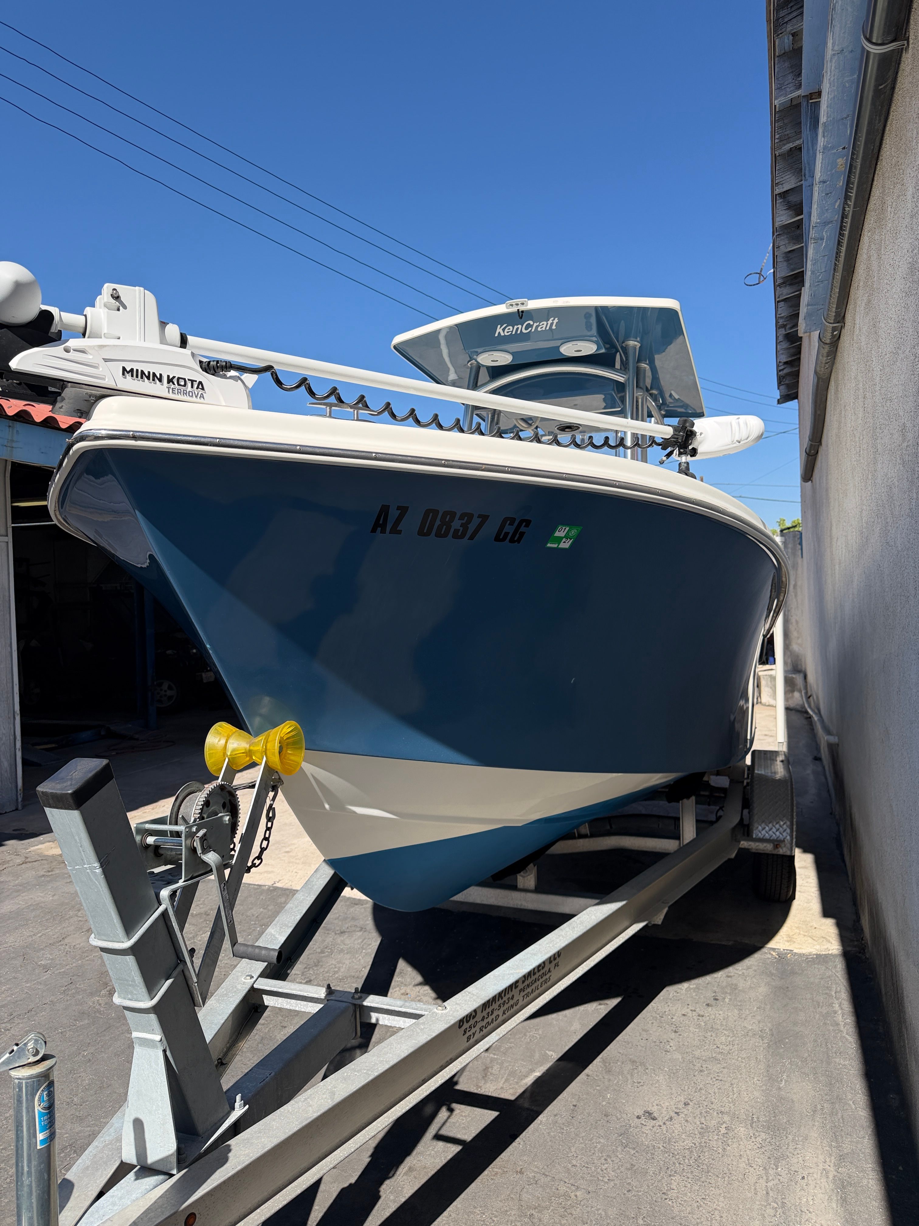 KenCraft Challenger 2021 on trailer, blue sky.