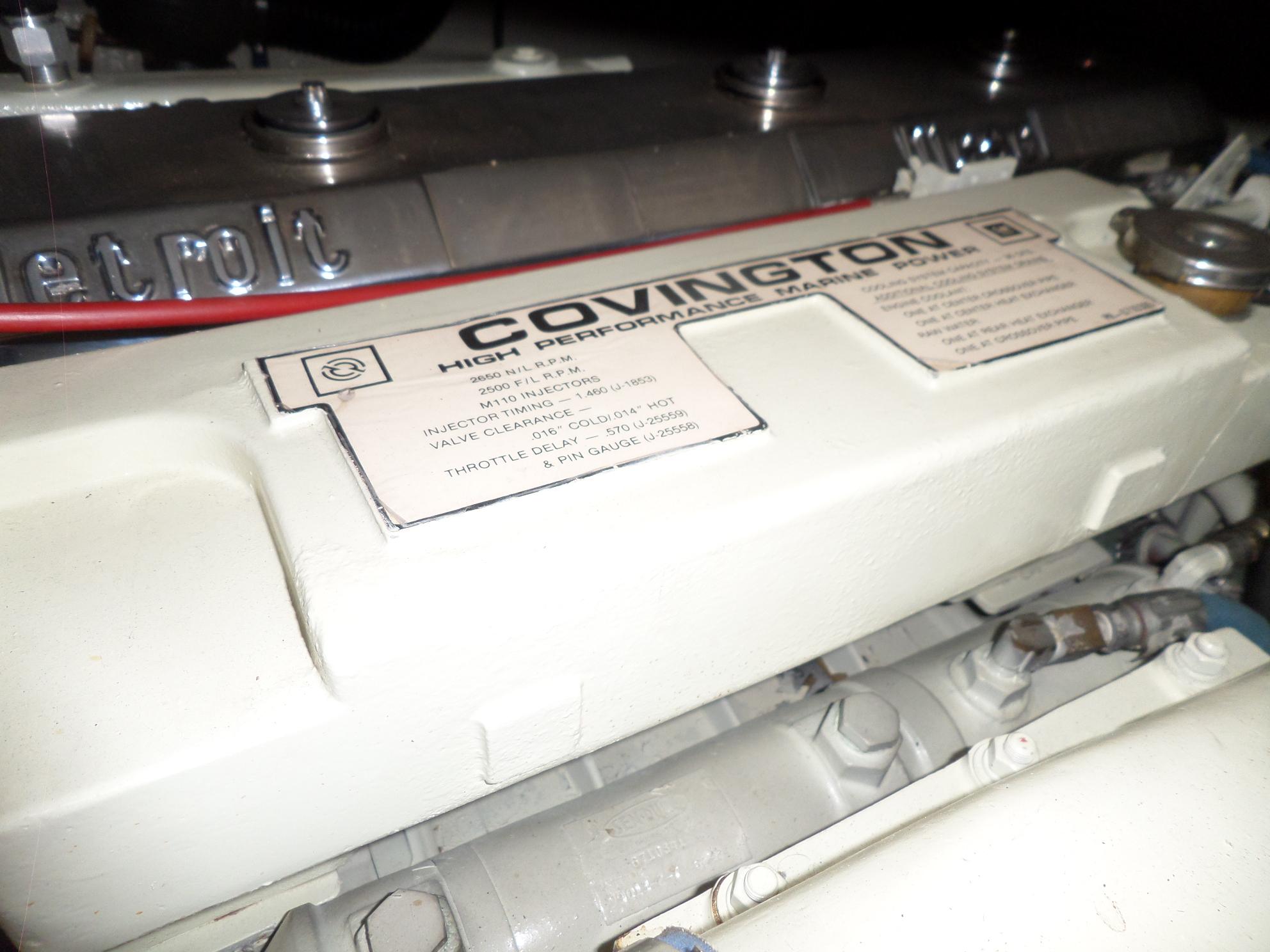 Engine of 1987 Hatteras 42 Convertible with Covington high-performance marine power label.