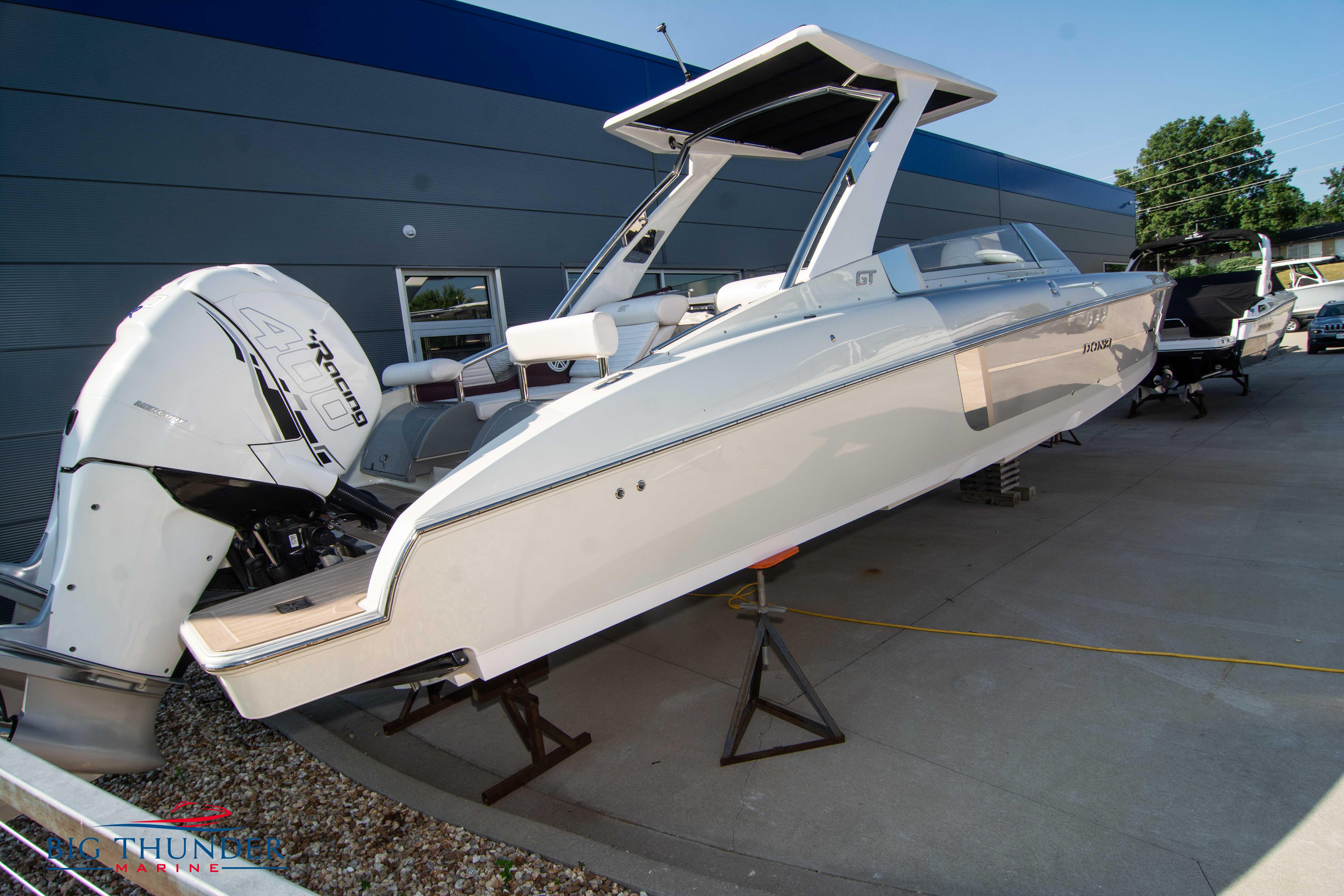 2019 Donzi 41 GT boat on display with twin outboard engines.