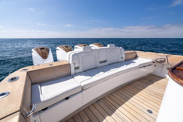 Luxury HCB 53 Sueños 2020 boat with spacious seating and ocean view.