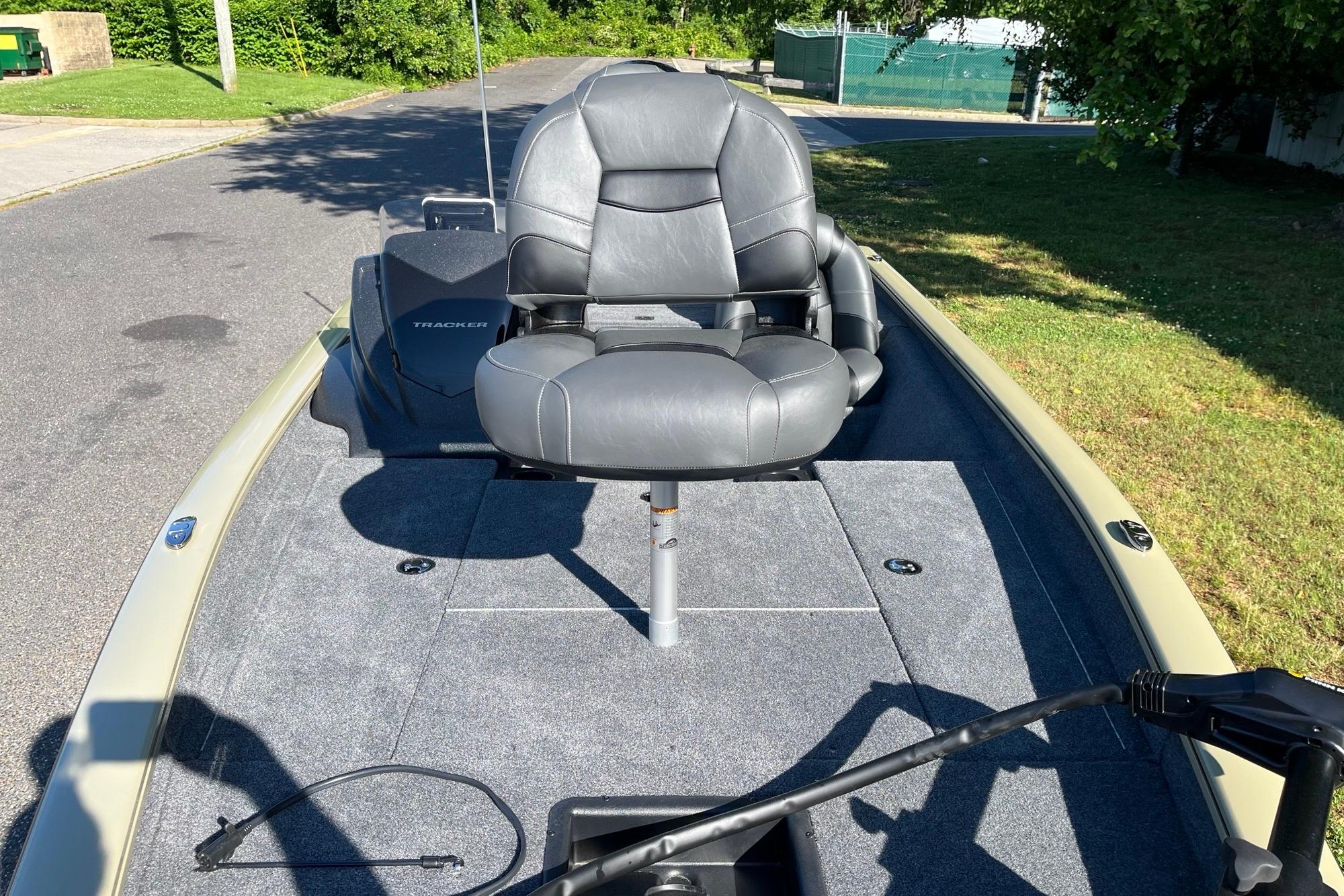 2026 Tracker Pro Team 175 boat with gray seating on a sunny day.
