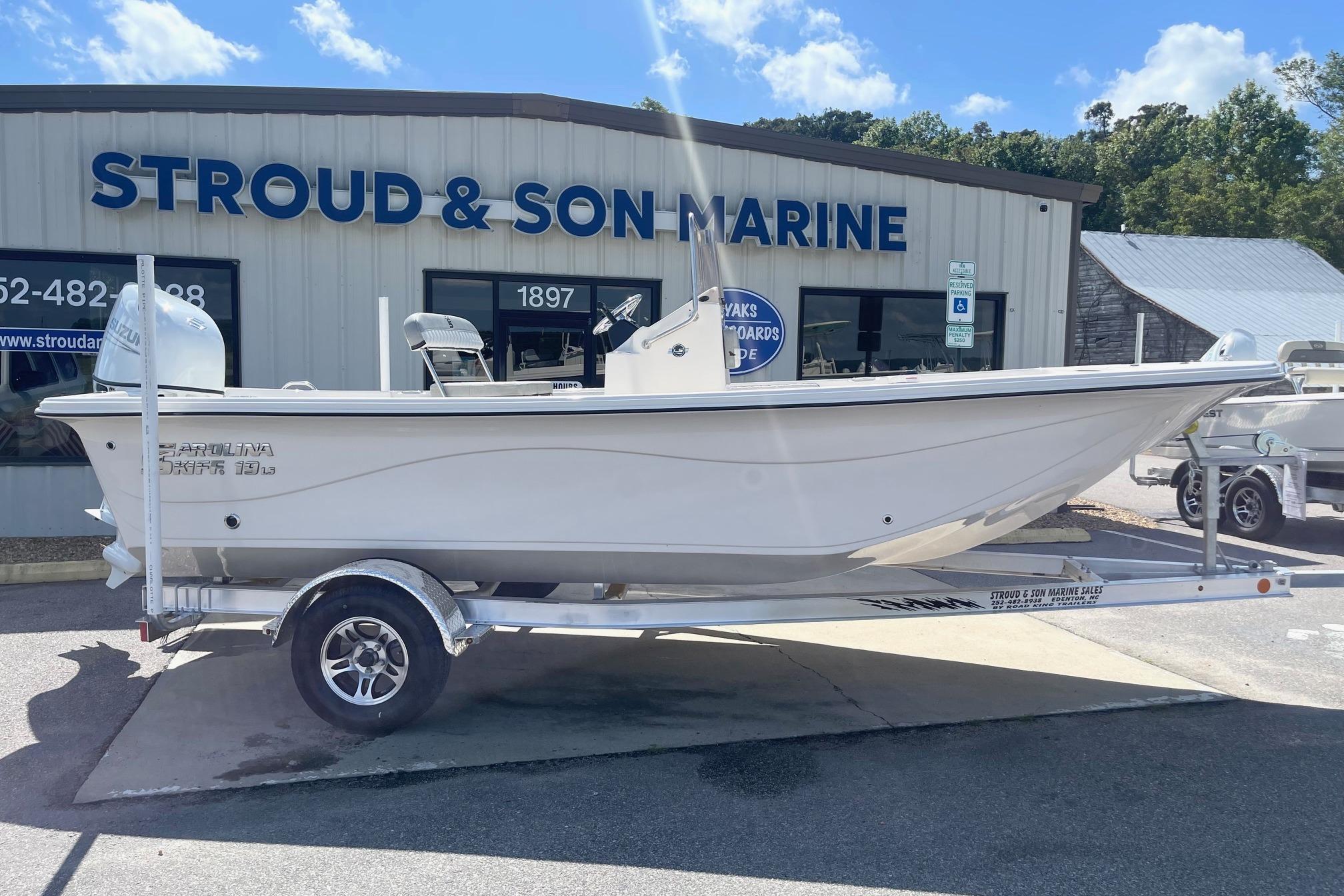 2026 Carolina Skiff 19 LS boat on trailer at Stroud & Son Marine dealership.