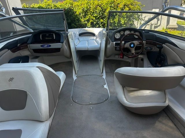 Interior of a 2006 Four Winns 190 Horizon with gray and white seating.