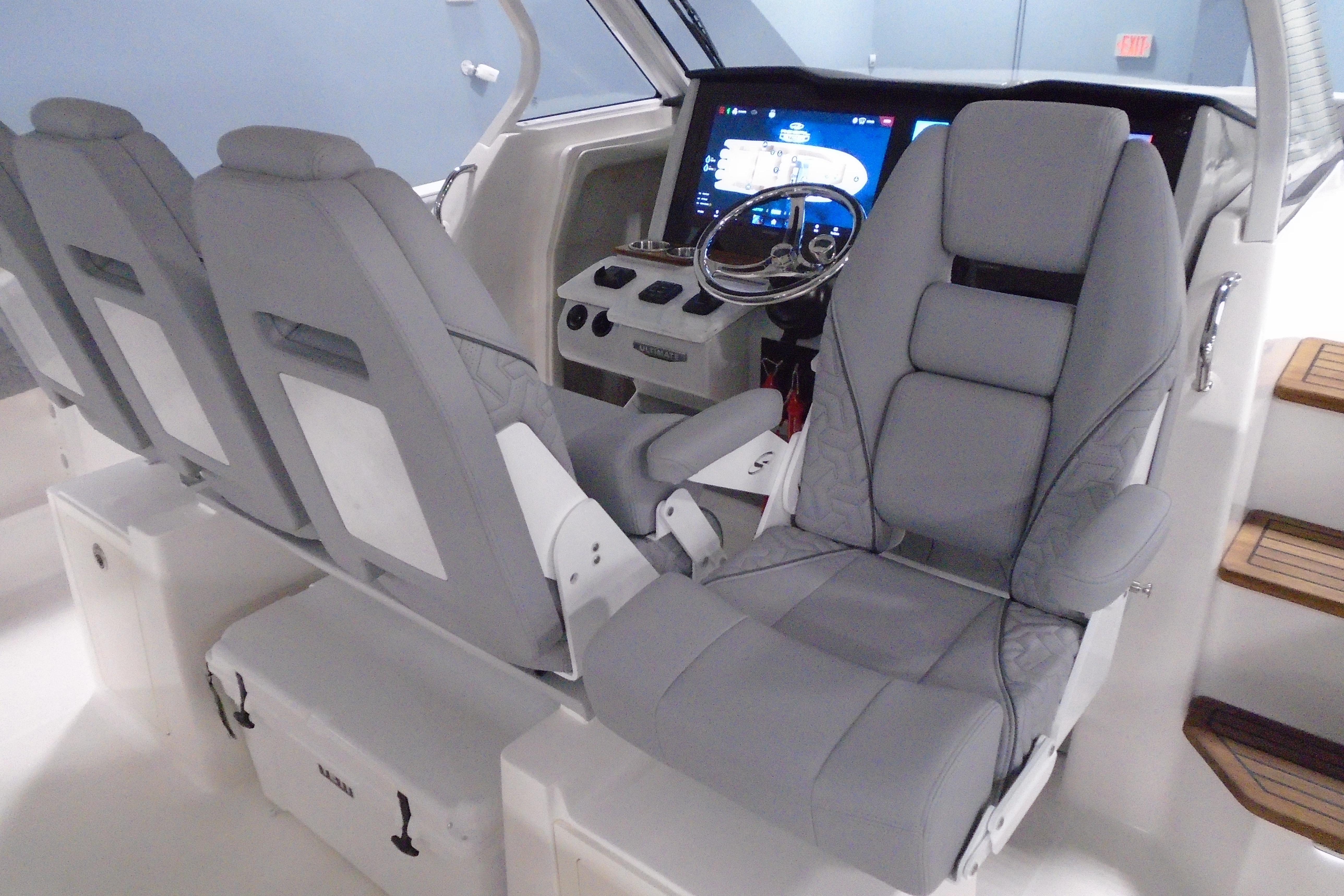 2026 Regal 38 SAV boat cockpit with modern controls and comfortable seating.