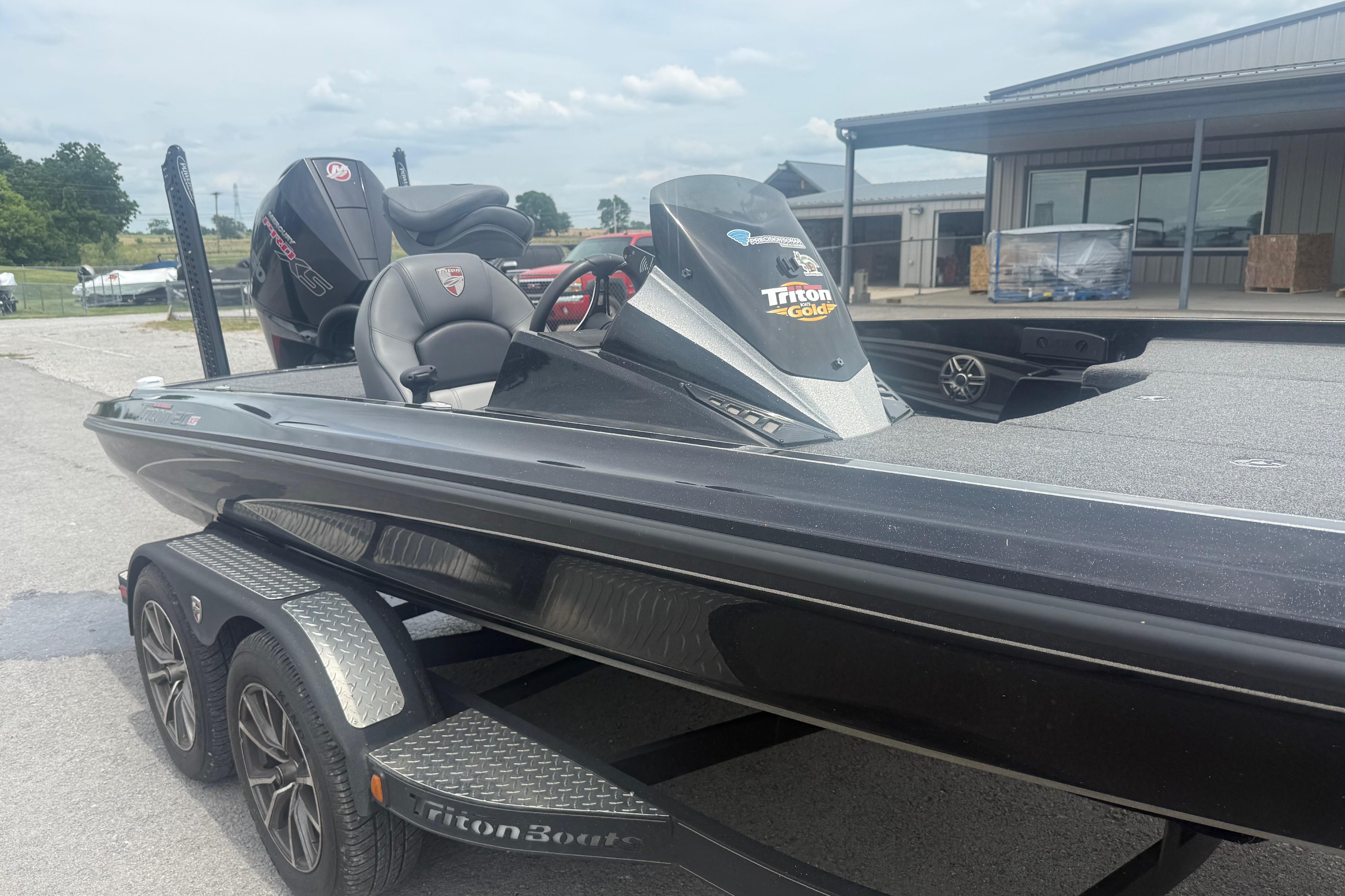 2024 Triton 20XP boat on trailer, featuring sleek design and modern features.
