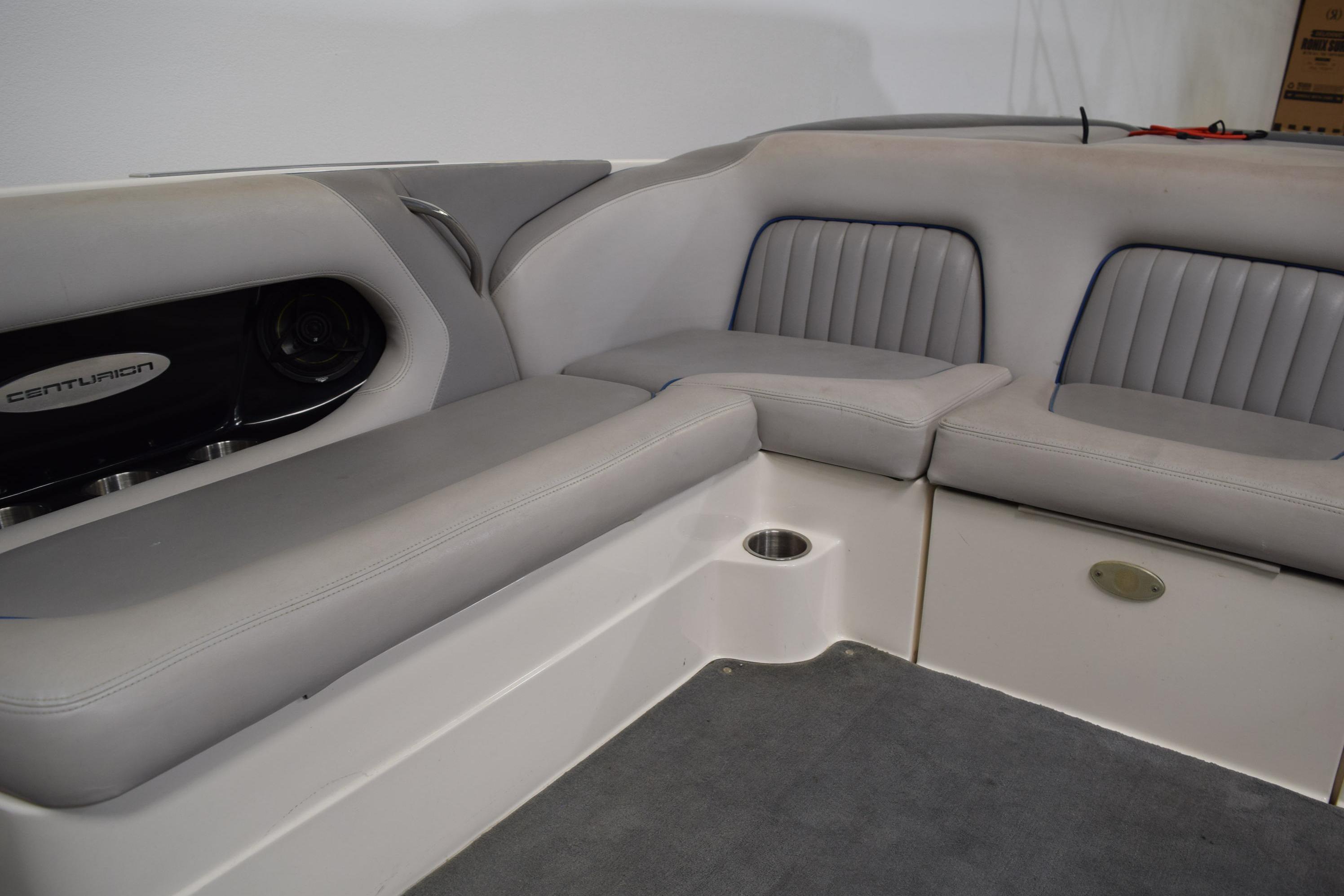2007 Centurion SV 240 boat interior with gray seating and speaker system.