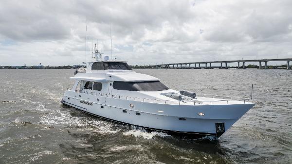 Grand Harbour 76 yacht cruising on water, 2001 model.