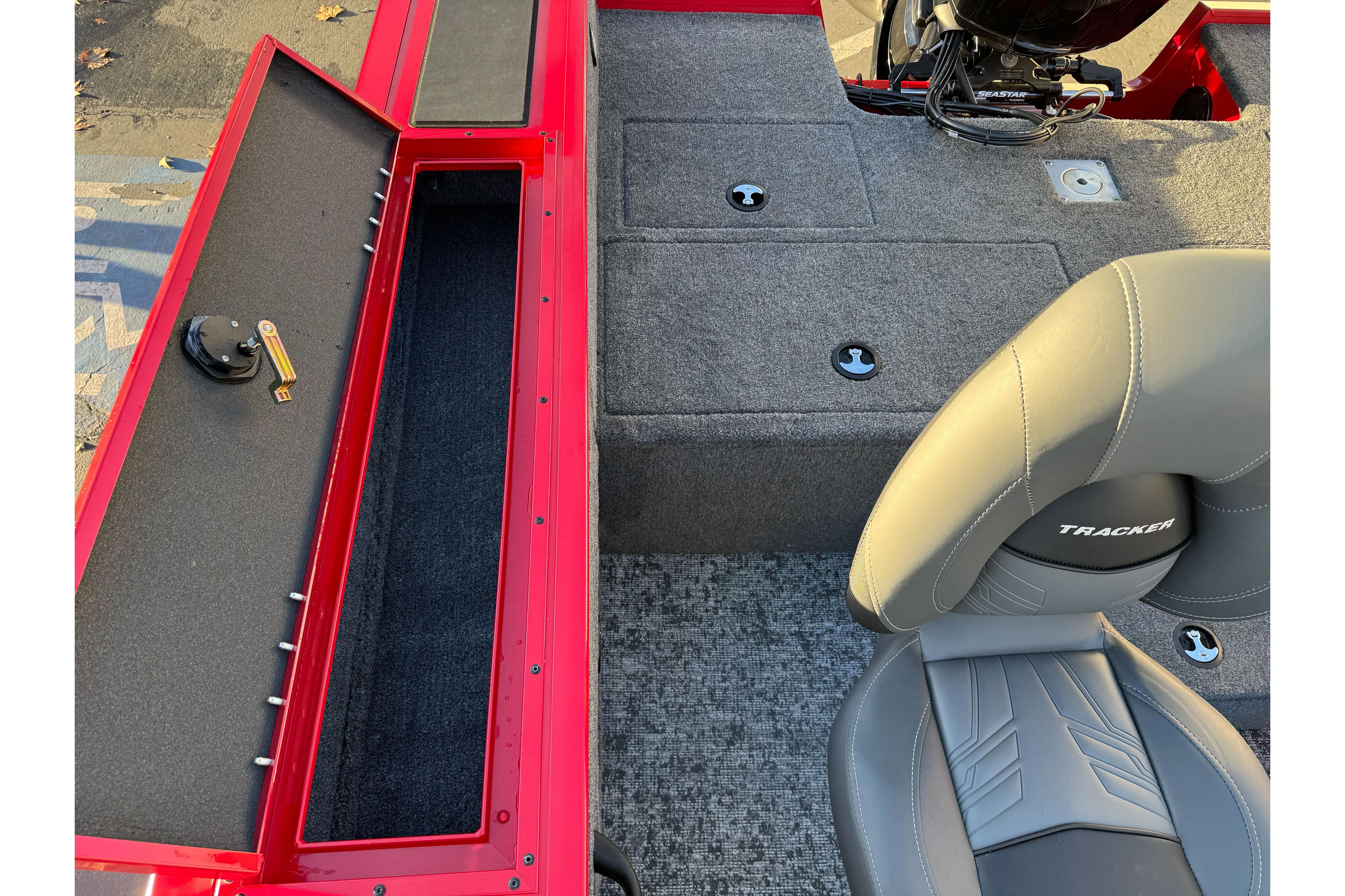 2026 Tracker Targa V-18 WT boat interior with storage compartment and seating.